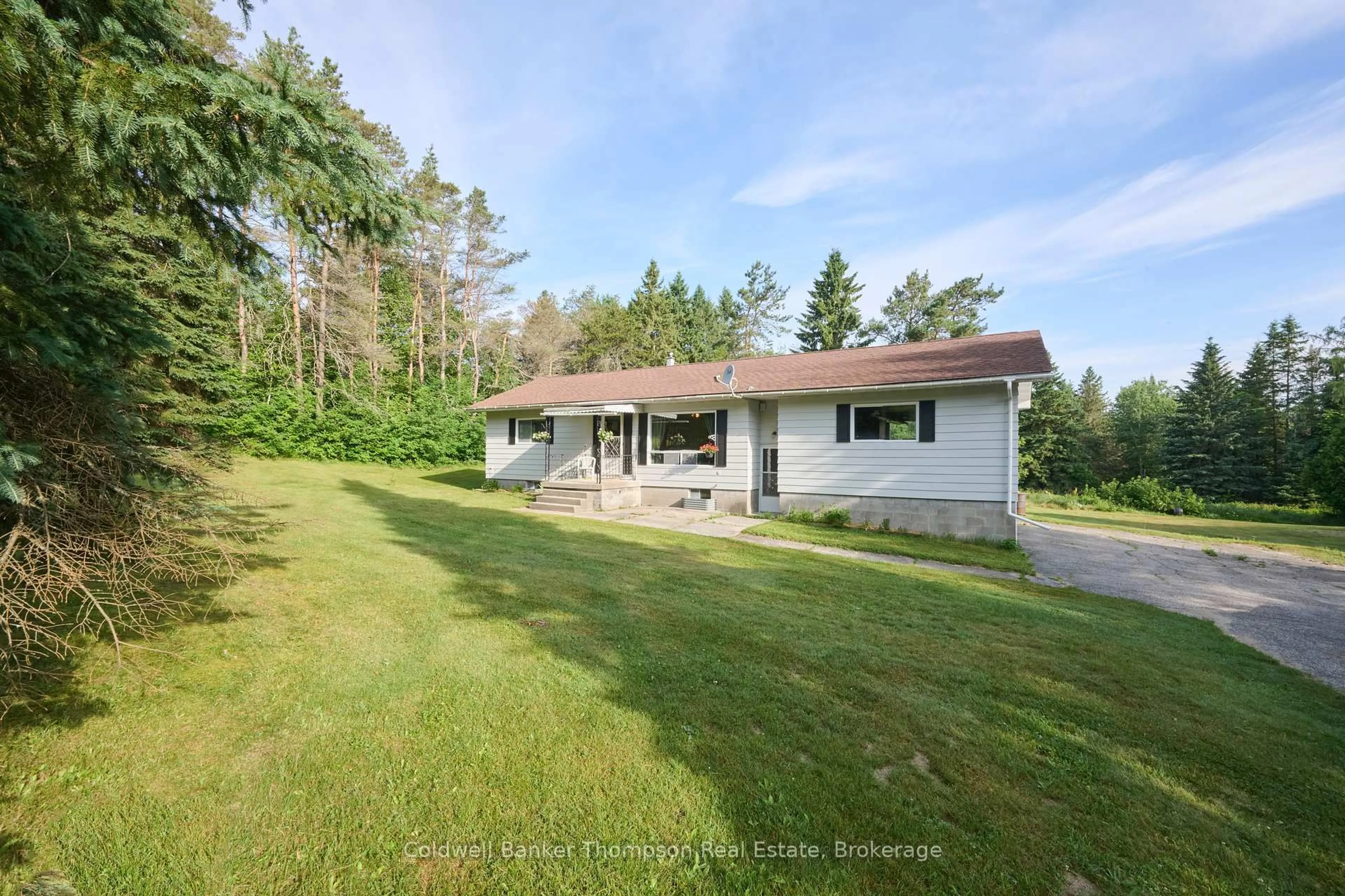 A pic from outside/outdoor area/front of a property/back of a property/a pic from drone, water/lake/river/ocean view for 28 Star Lake Rd, Perry Ontario P0A 1J0