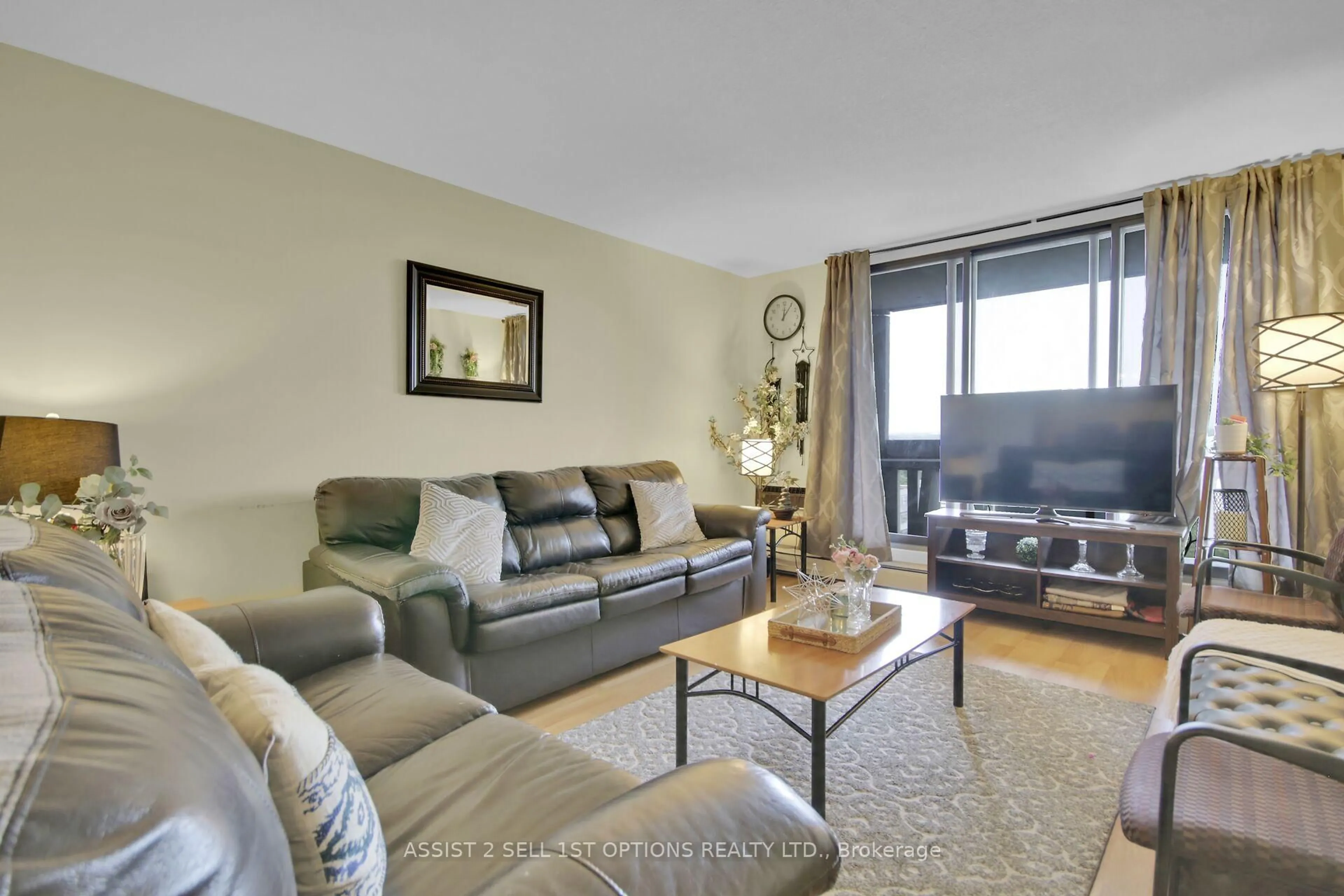 Living room with furniture, wood/laminate floor for 415 Greenview Ave #301, Ottawa Ontario K2B 8G5