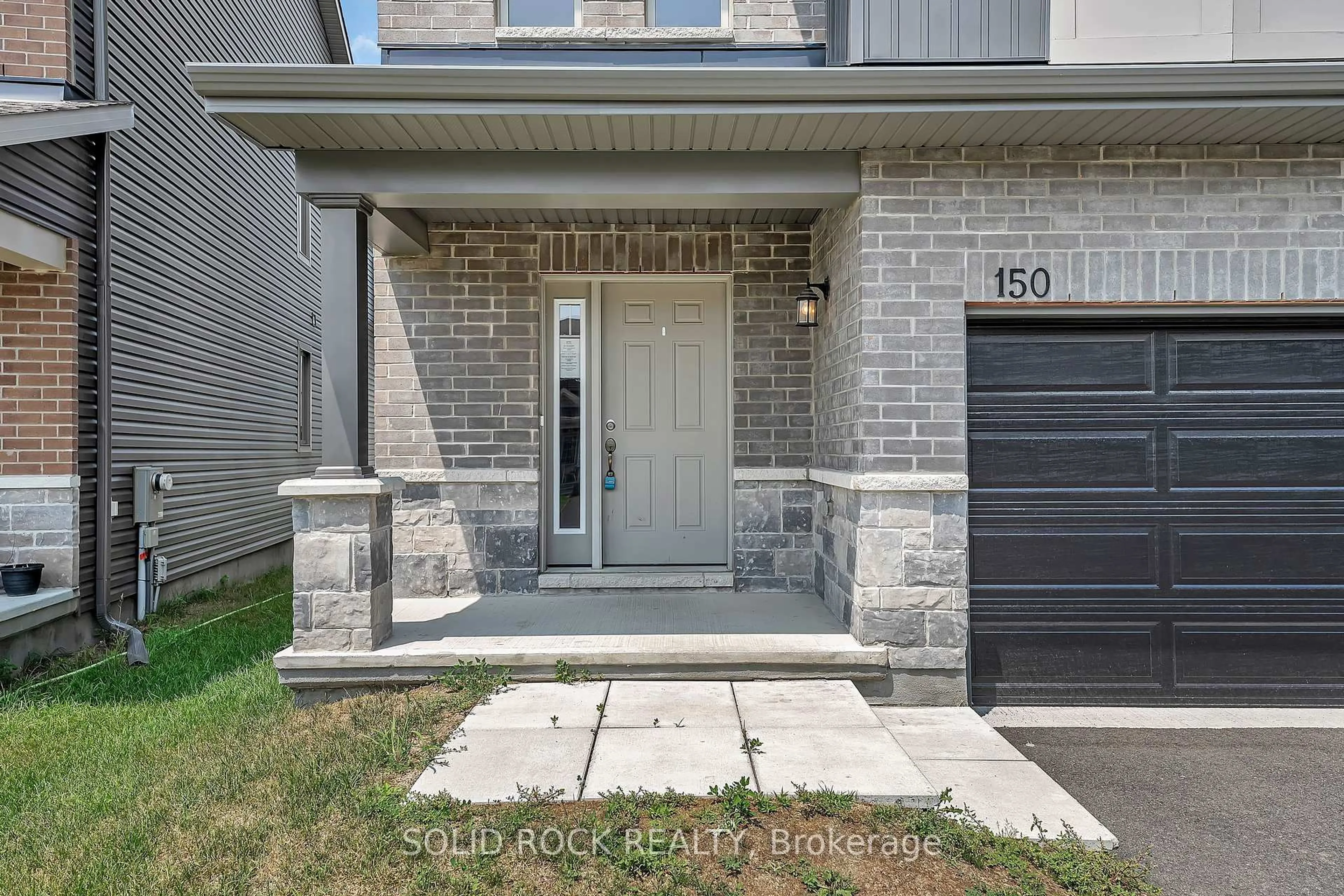 Home with brick exterior material, street for 150 Minikan St, Ottawa Ontario K1X 0E5