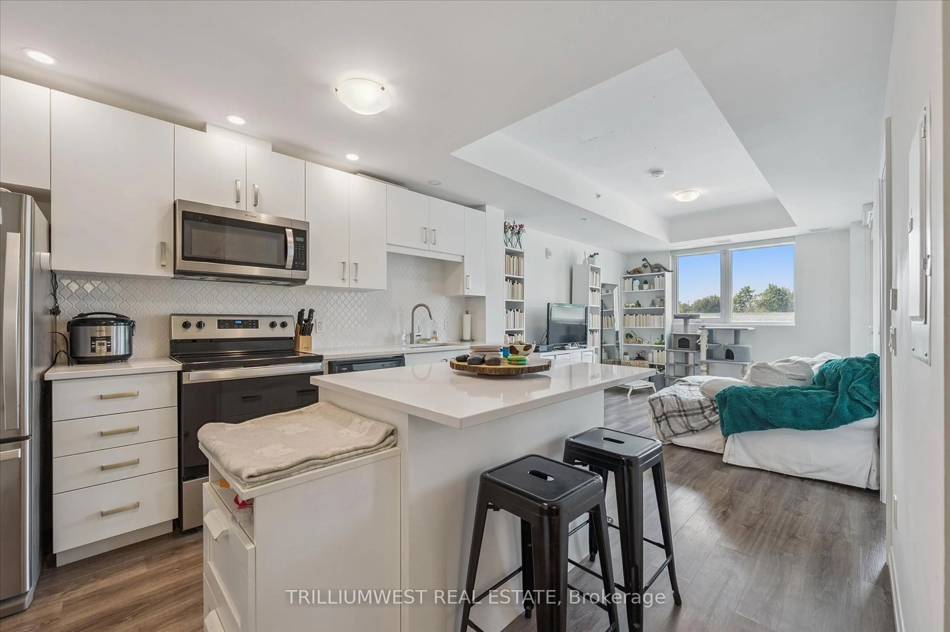 Open concept kitchen, ceramic/tile floor for 108 Garment St #213, Kitchener Ontario N2G 0E2