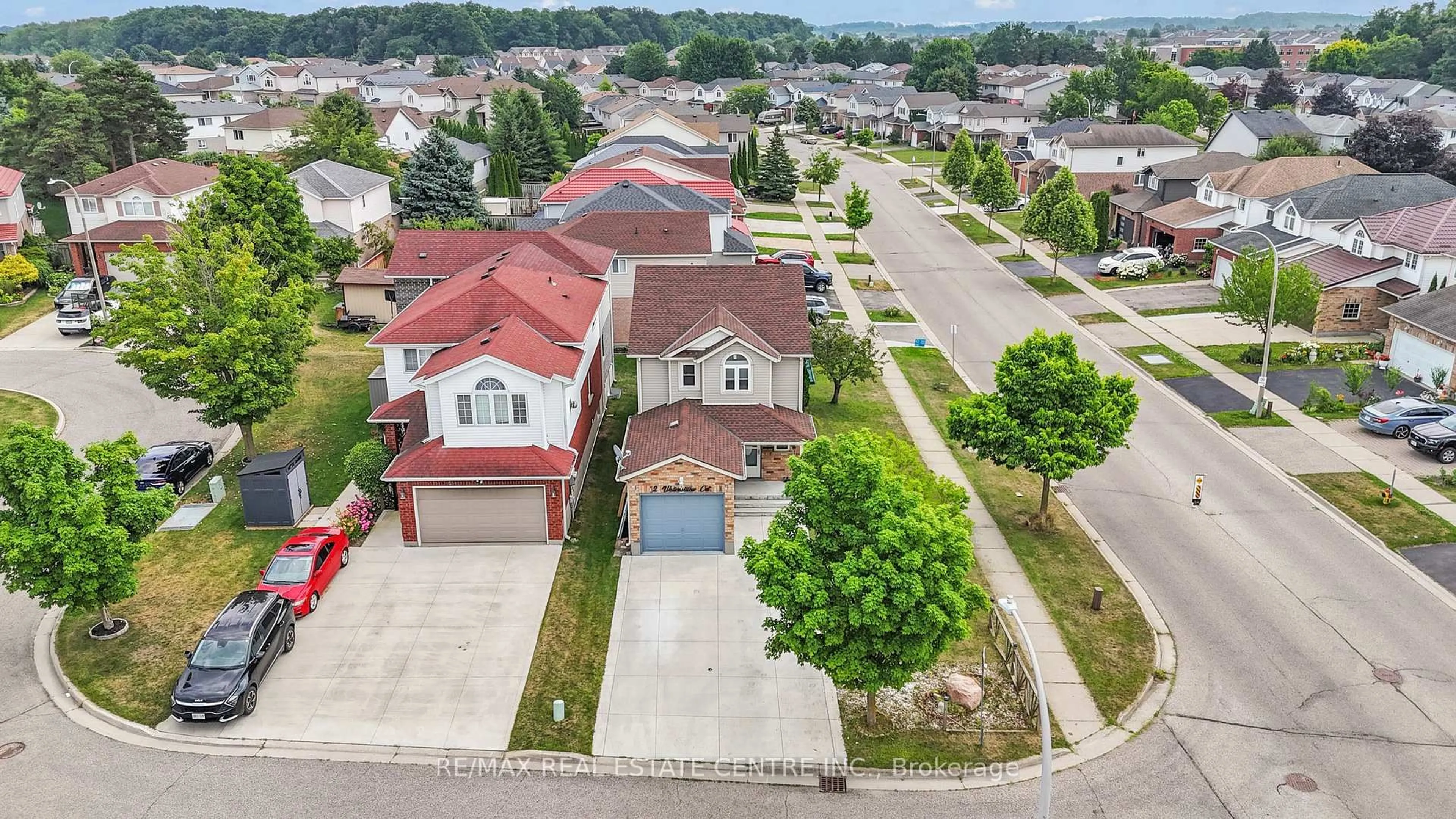 A pic from outside/outdoor area/front of a property/back of a property/a pic from drone, street for 2 Waterwillow Crt, Kitchener Ontario N2E 3N8