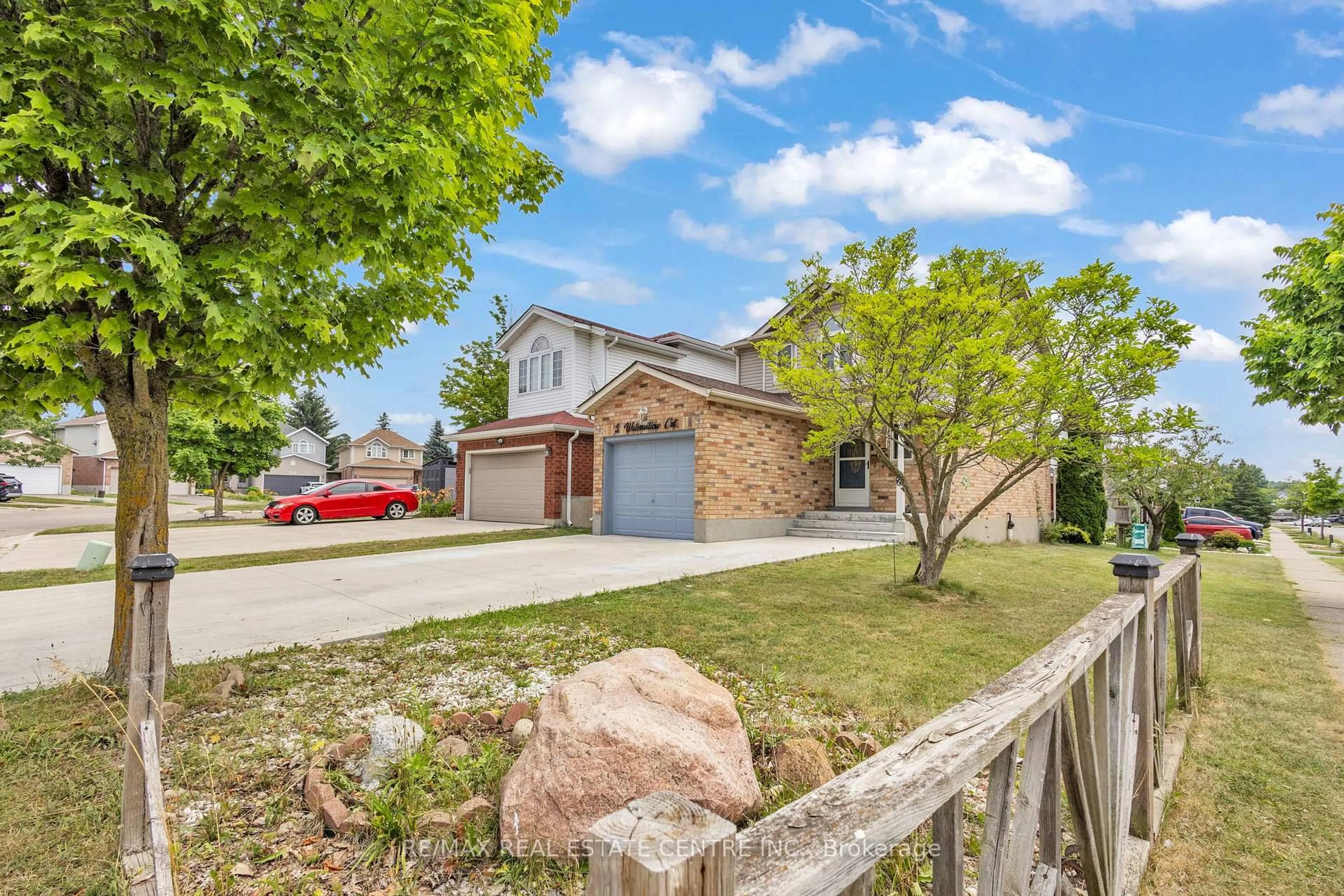 A pic from outside/outdoor area/front of a property/back of a property/a pic from drone, street for 2 Waterwillow Crt, Kitchener Ontario N2E 3N8