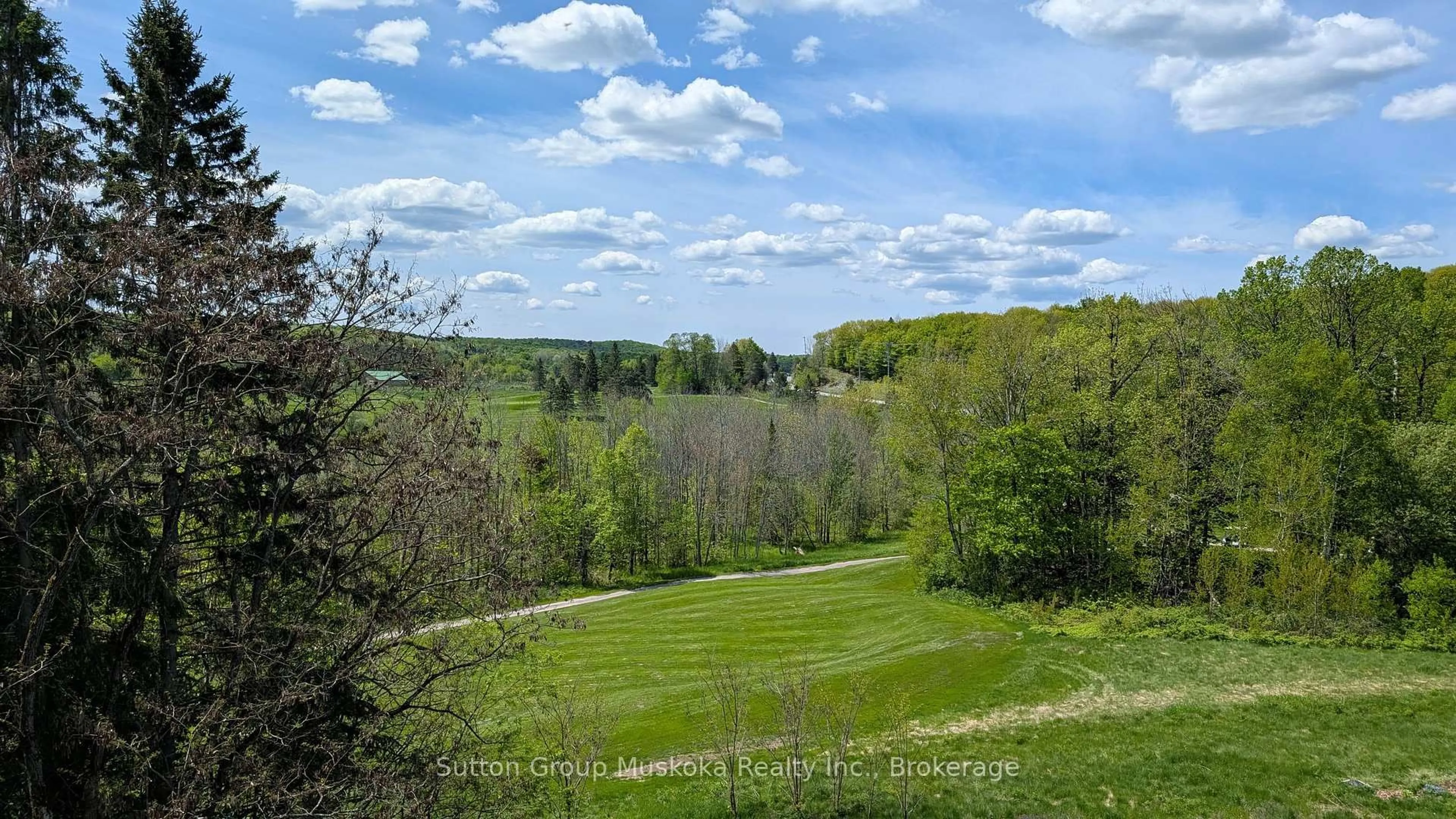A pic from outside/outdoor area/front of a property/back of a property/a pic from drone, forest/trees view for 53-303 Summit Lodge Dr #Deerhurst Resort, Huntsville Ontario P1H 2E8