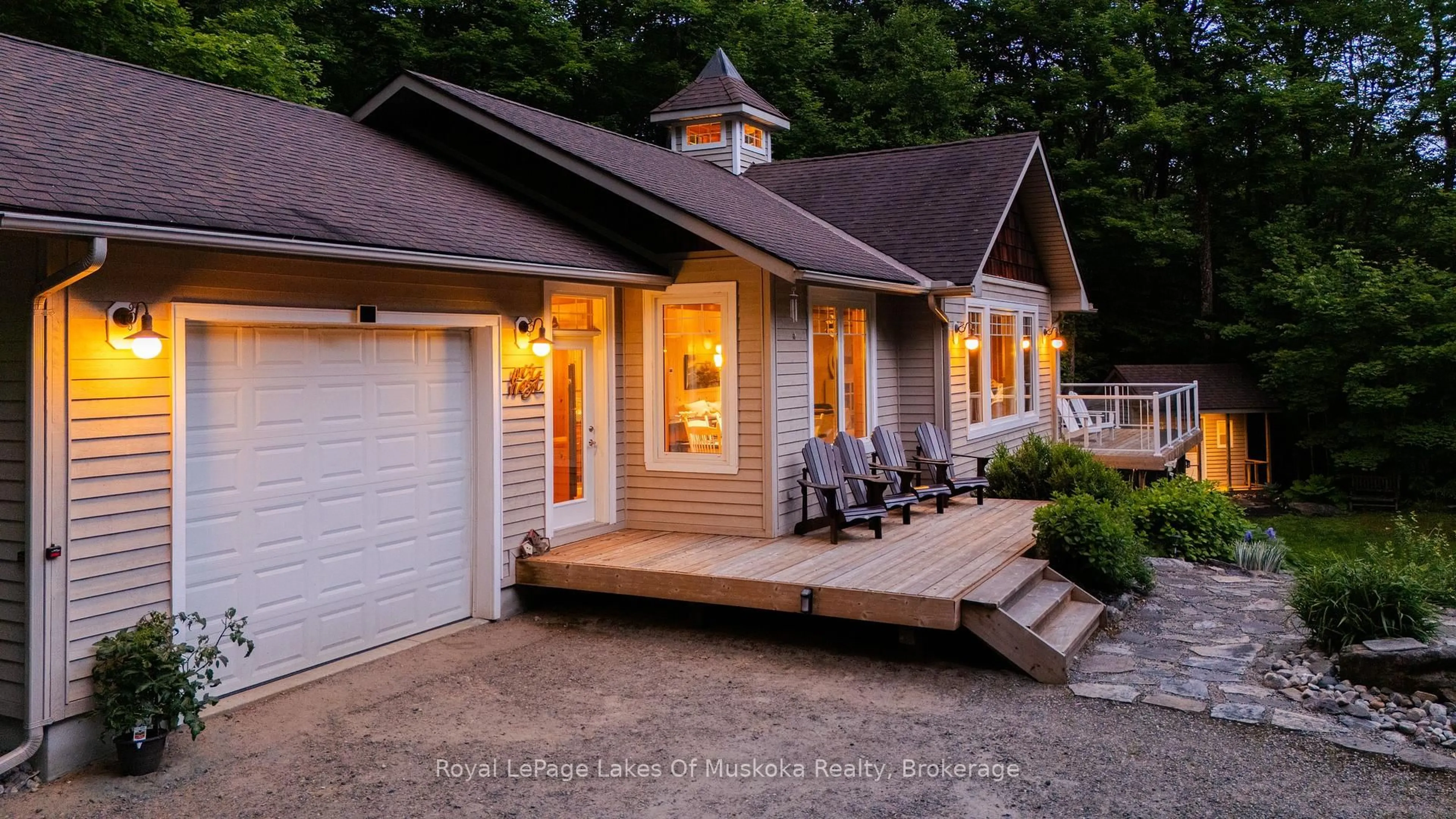 Home with vinyl exterior material, street for 42 Menominee Lake Rd, Huntsville Ontario P1H 2J3