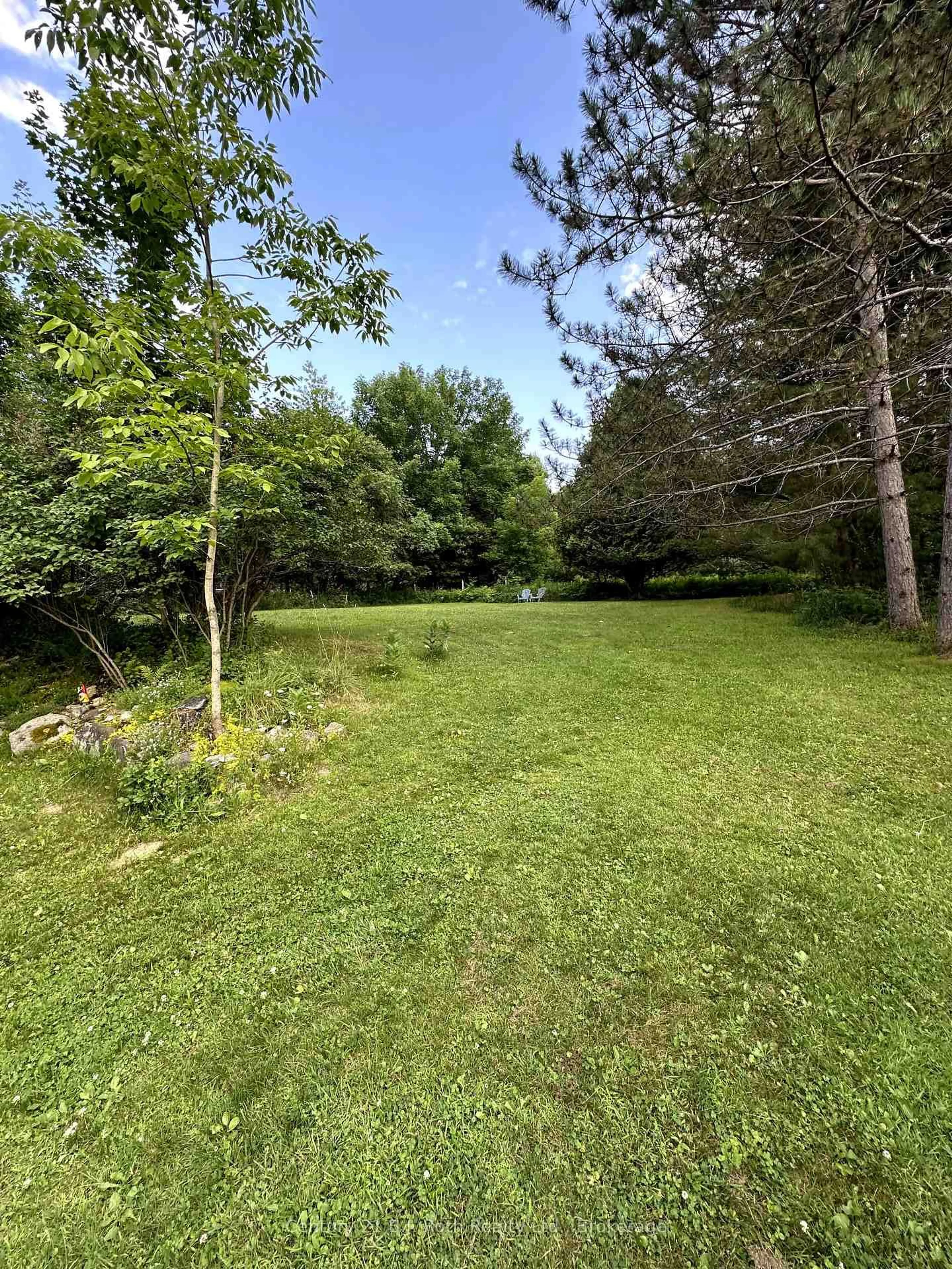 A pic from outside/outdoor area/front of a property/back of a property/a pic from drone, water/lake/river/ocean view for 4 STOCKING Lane, Huntsville Ontario P1H 1V4