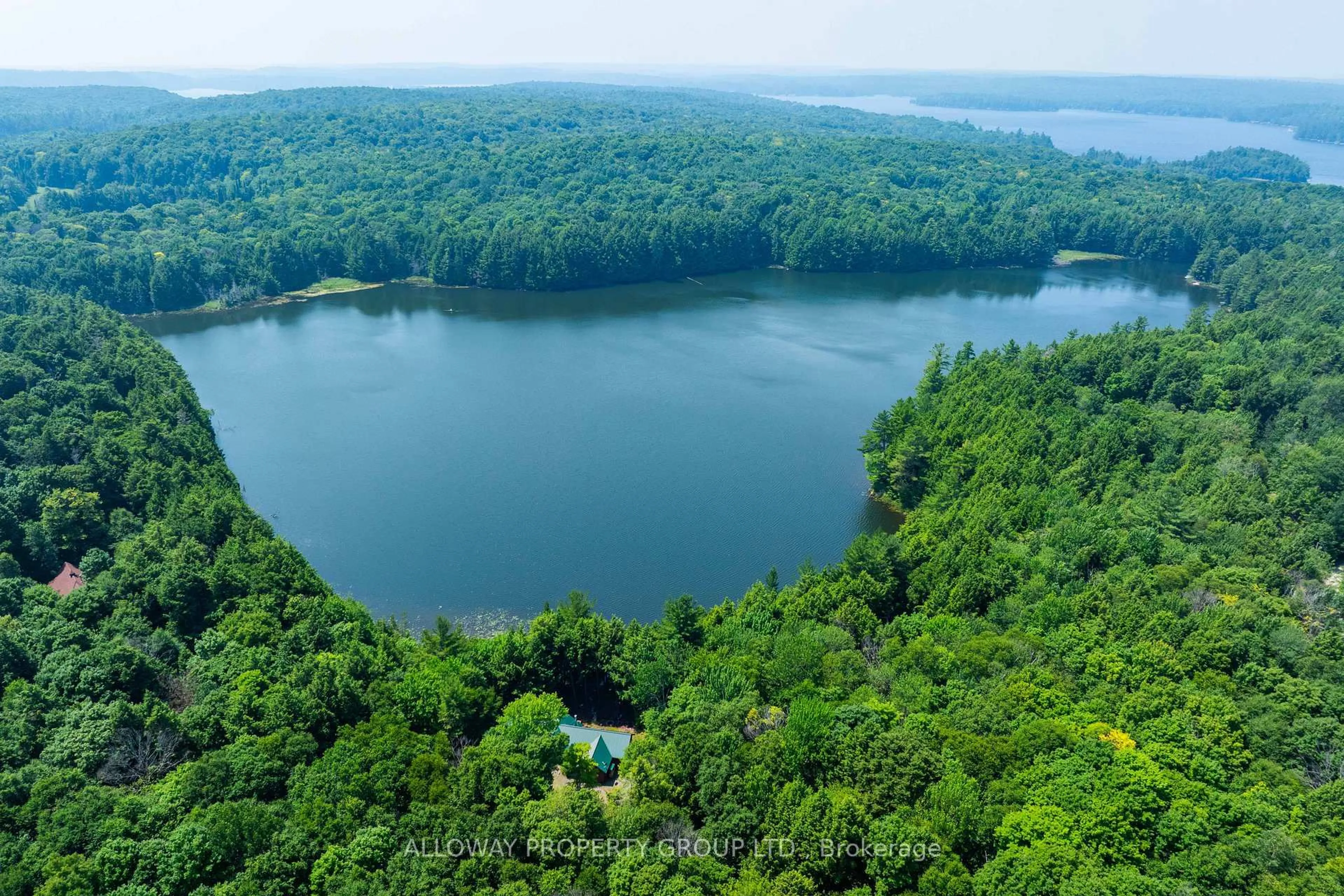 A pic from outside/outdoor area/front of a property/back of a property/a pic from drone, water/lake/river/ocean view for 1211 Birchy Lake Dr, Dysart et al Ontario K0M 1S0