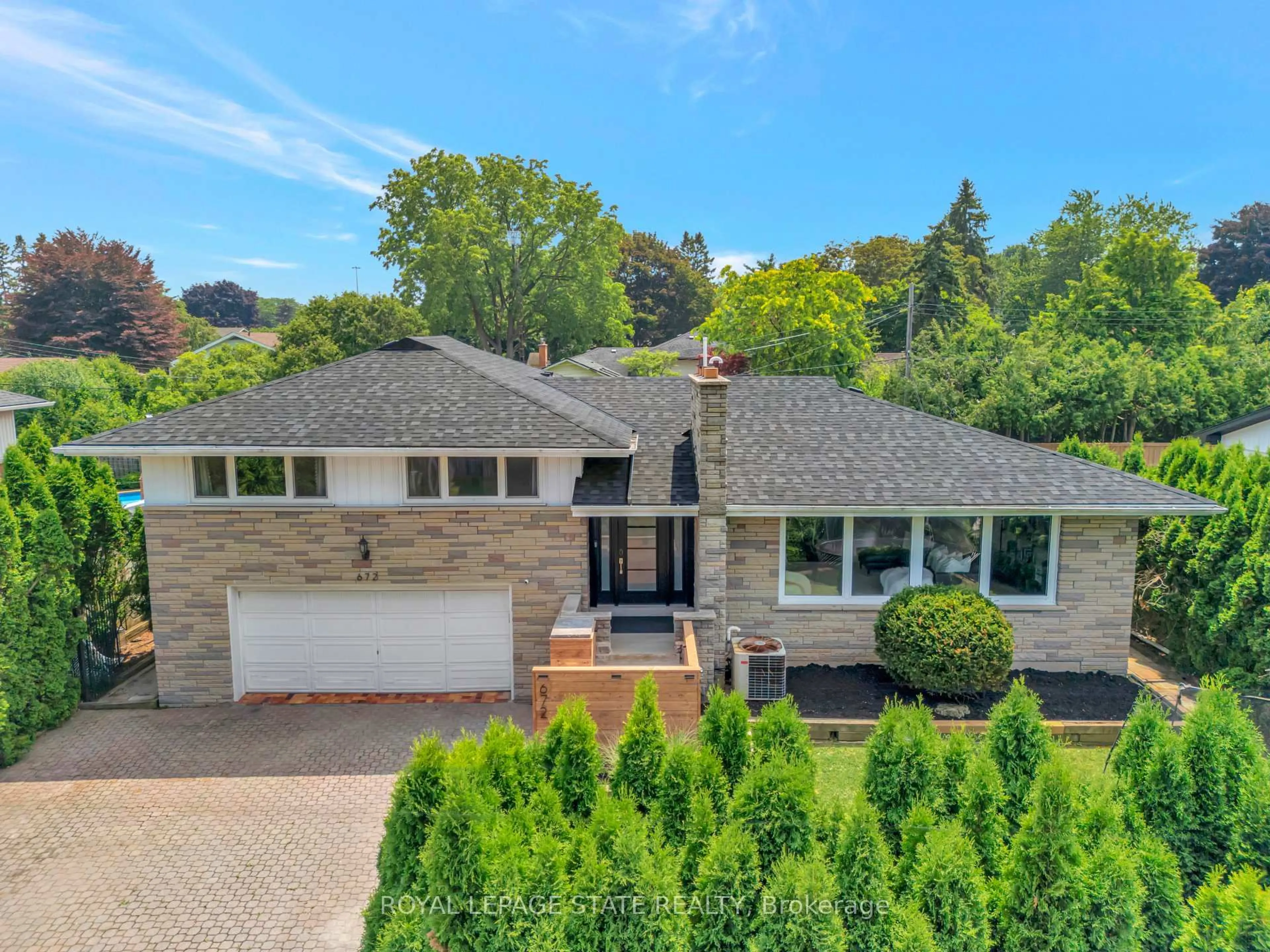 Home with brick exterior material, street for 672 Hiawatha Blvd, Hamilton Ontario L9G 3A5