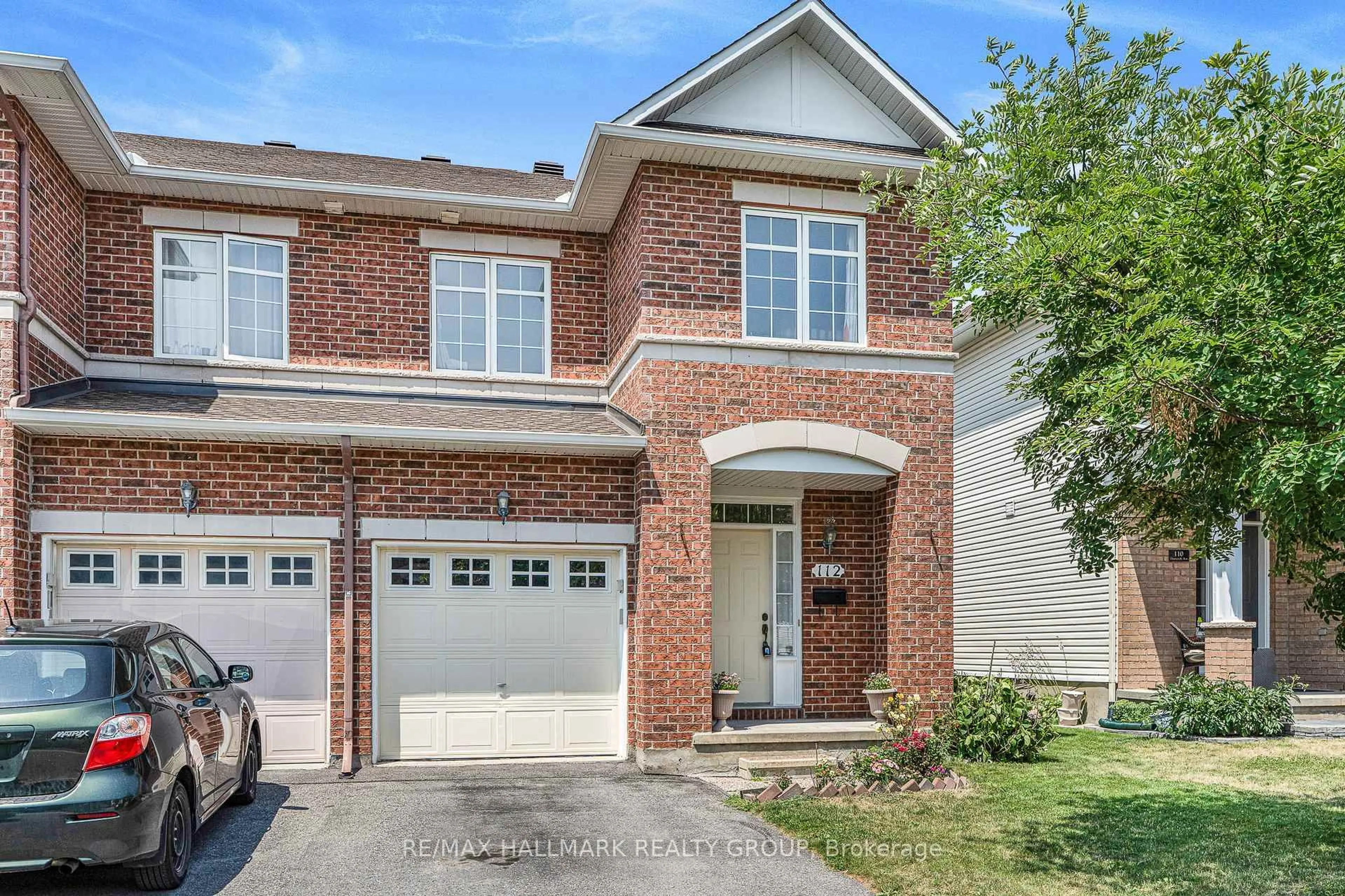Home with brick exterior material, street for 112 Deercroft Ave, Ottawa Ontario K2J 5H7