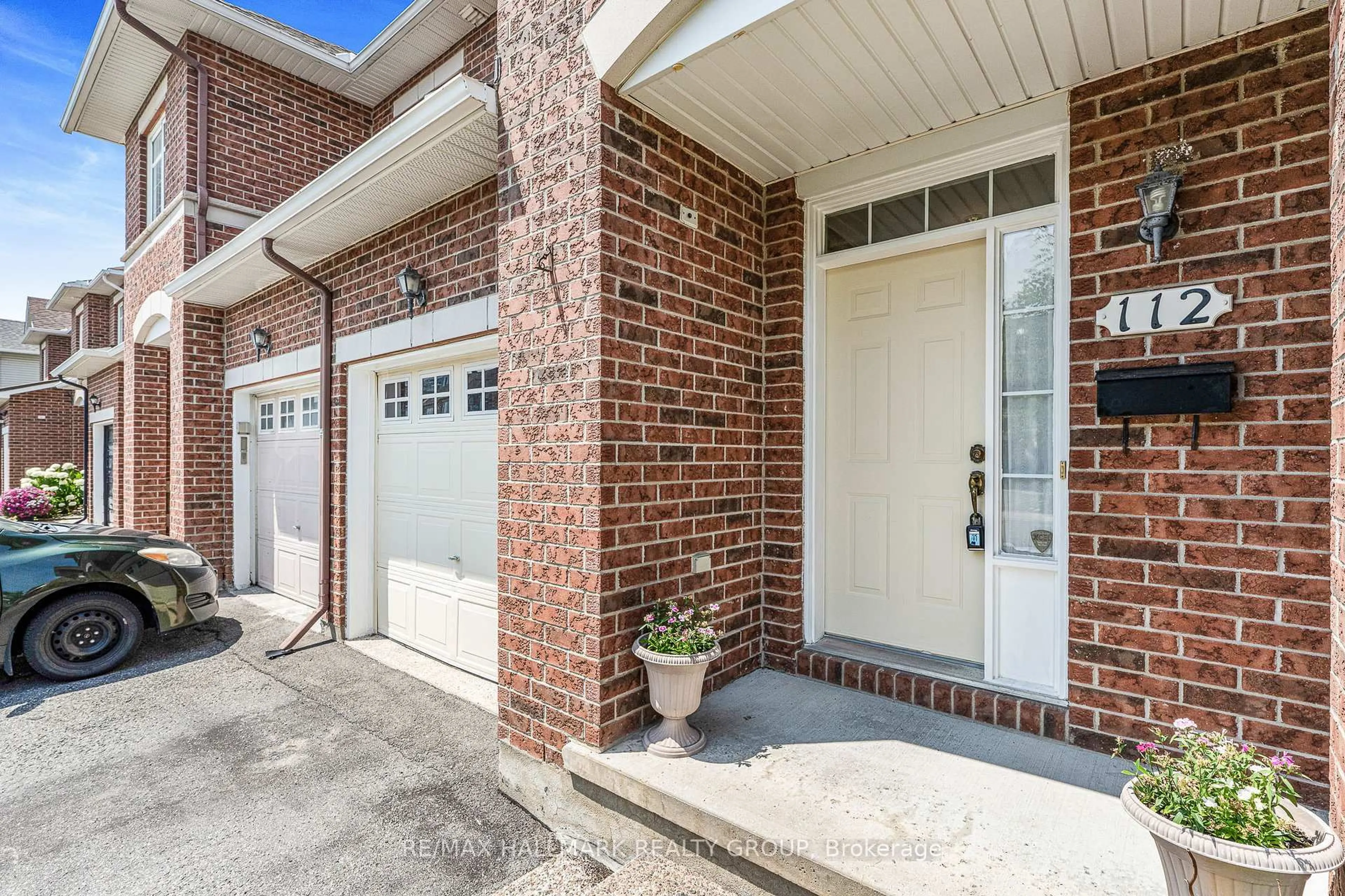 Home with brick exterior material, street for 112 Deercroft Ave, Ottawa Ontario K2J 5H7