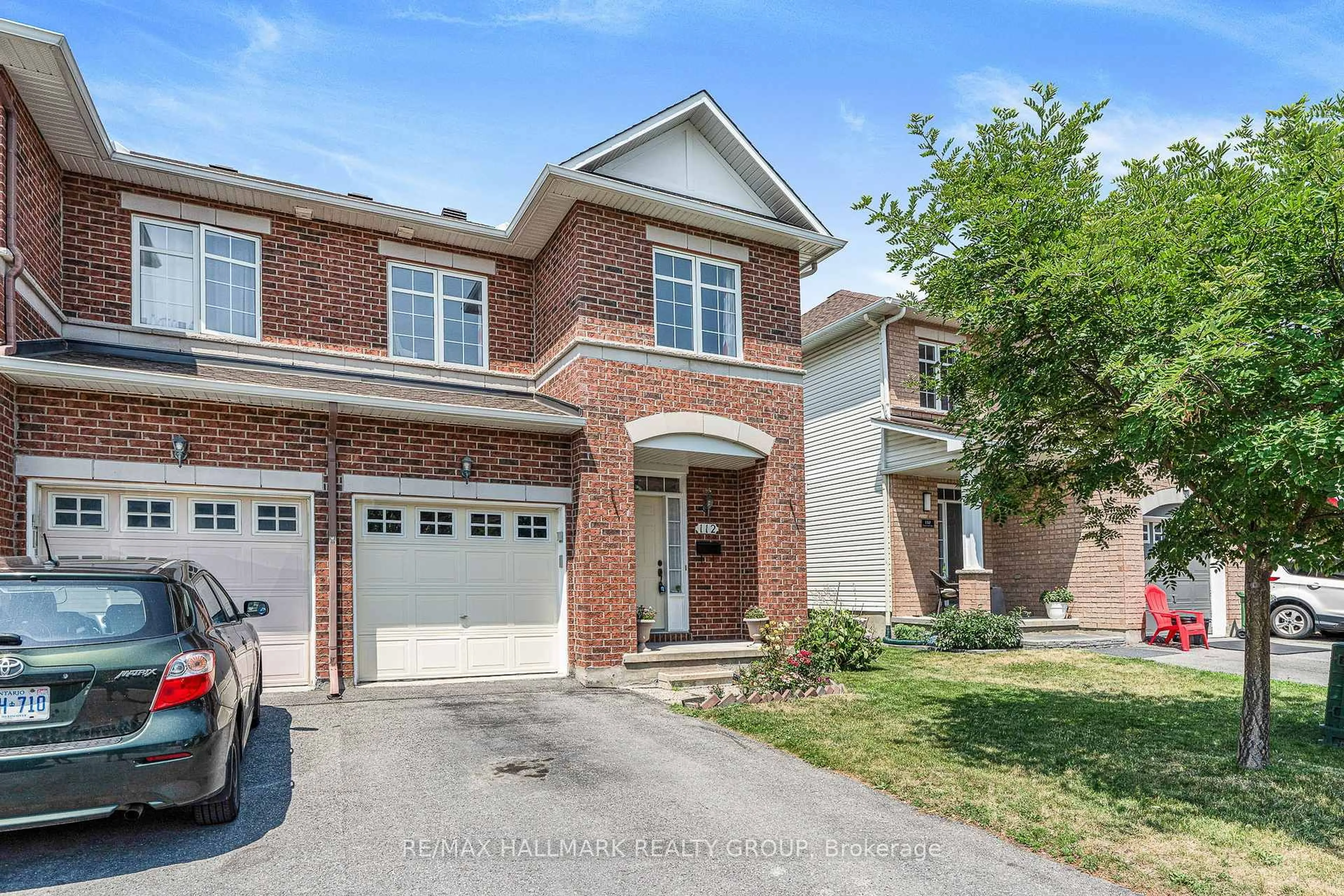 Home with brick exterior material, street for 112 Deercroft Ave, Ottawa Ontario K2J 5H7
