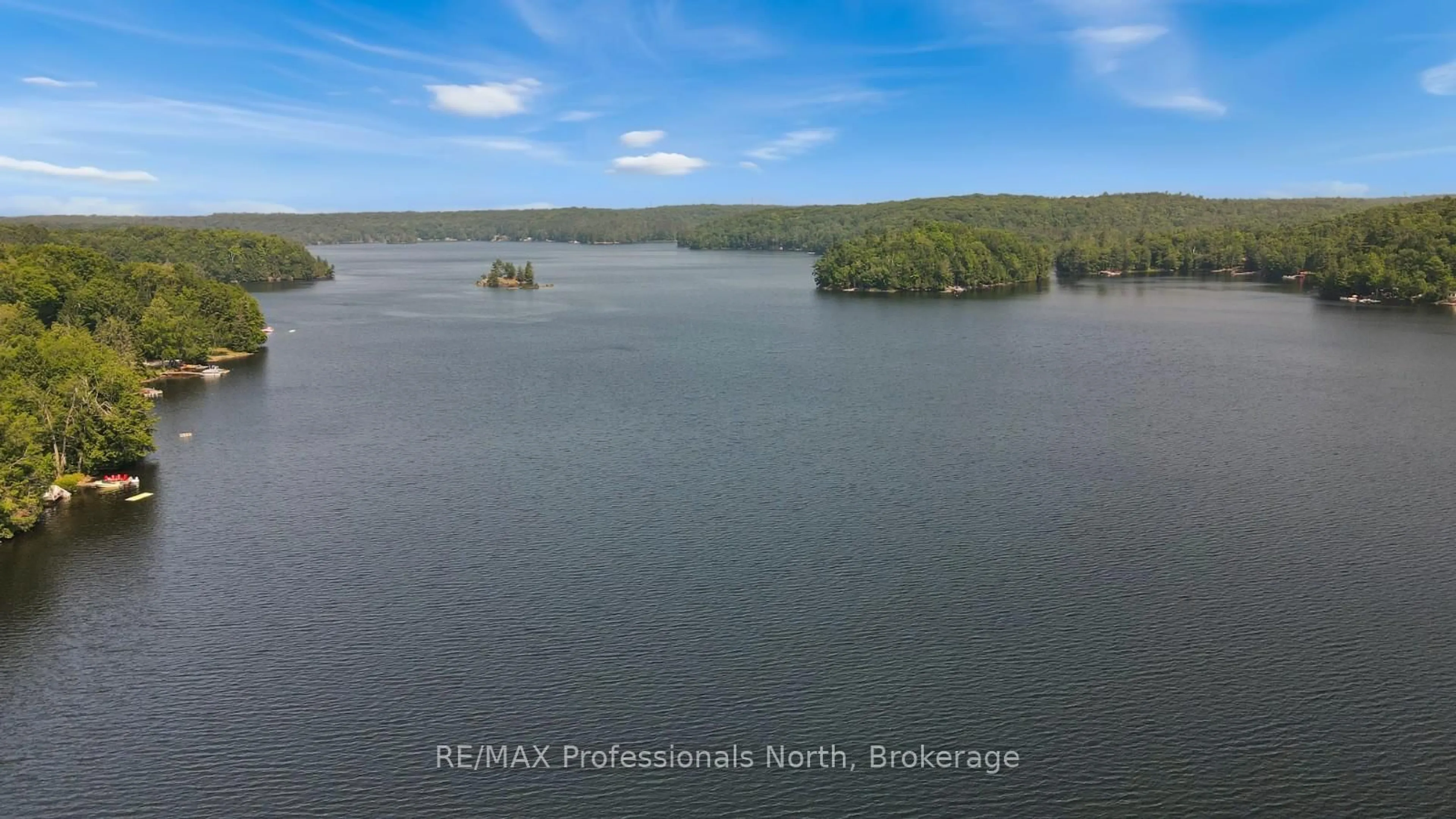 A pic from outside/outdoor area/front of a property/back of a property/a pic from drone, water/lake/river/ocean view for 1414 Tennyson Rd, Minden Hills Ontario K0M 2K0