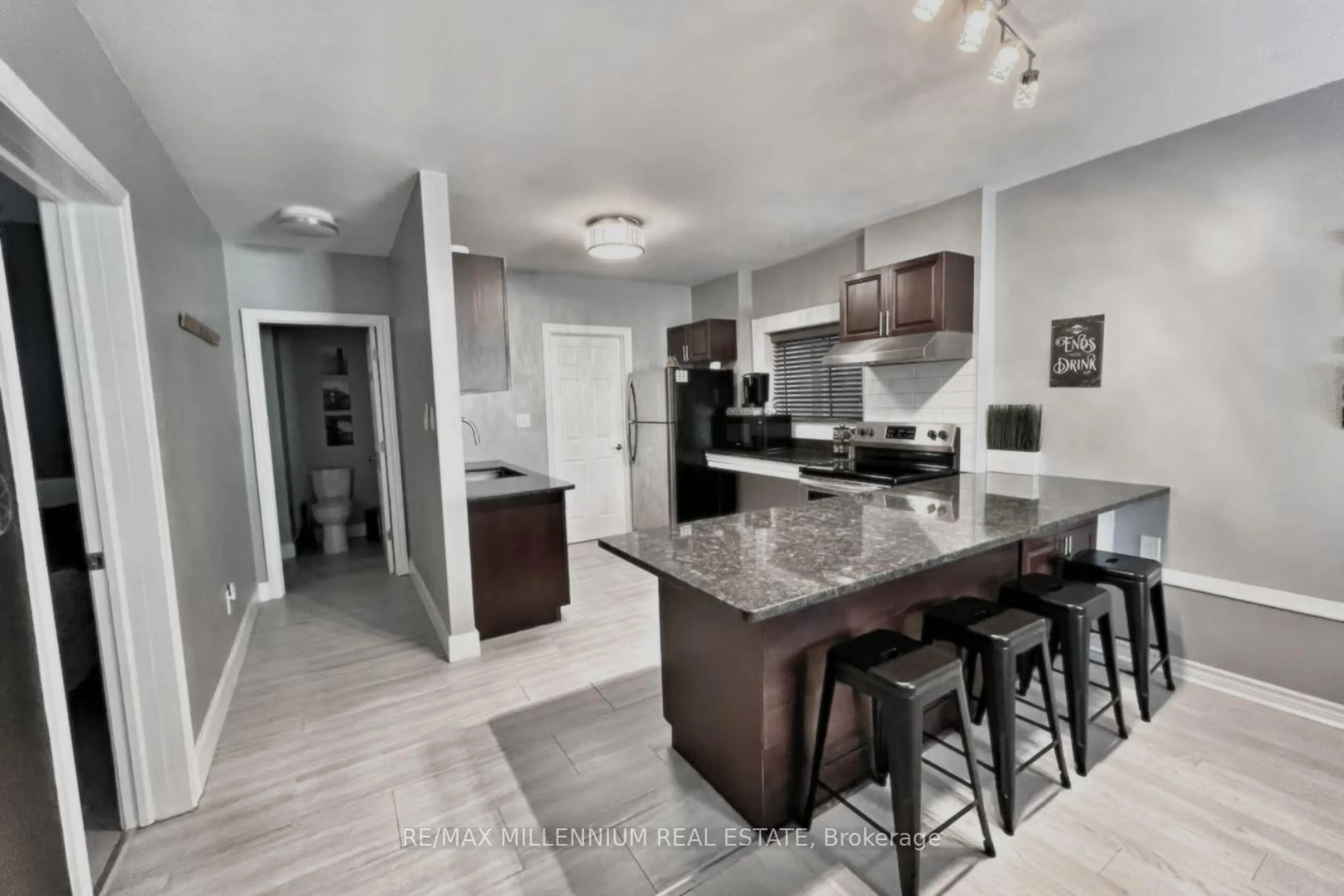 Open concept kitchen, ceramic/tile floor for 1064 Monmouth Rd, Windsor Ontario N8Y 3L7