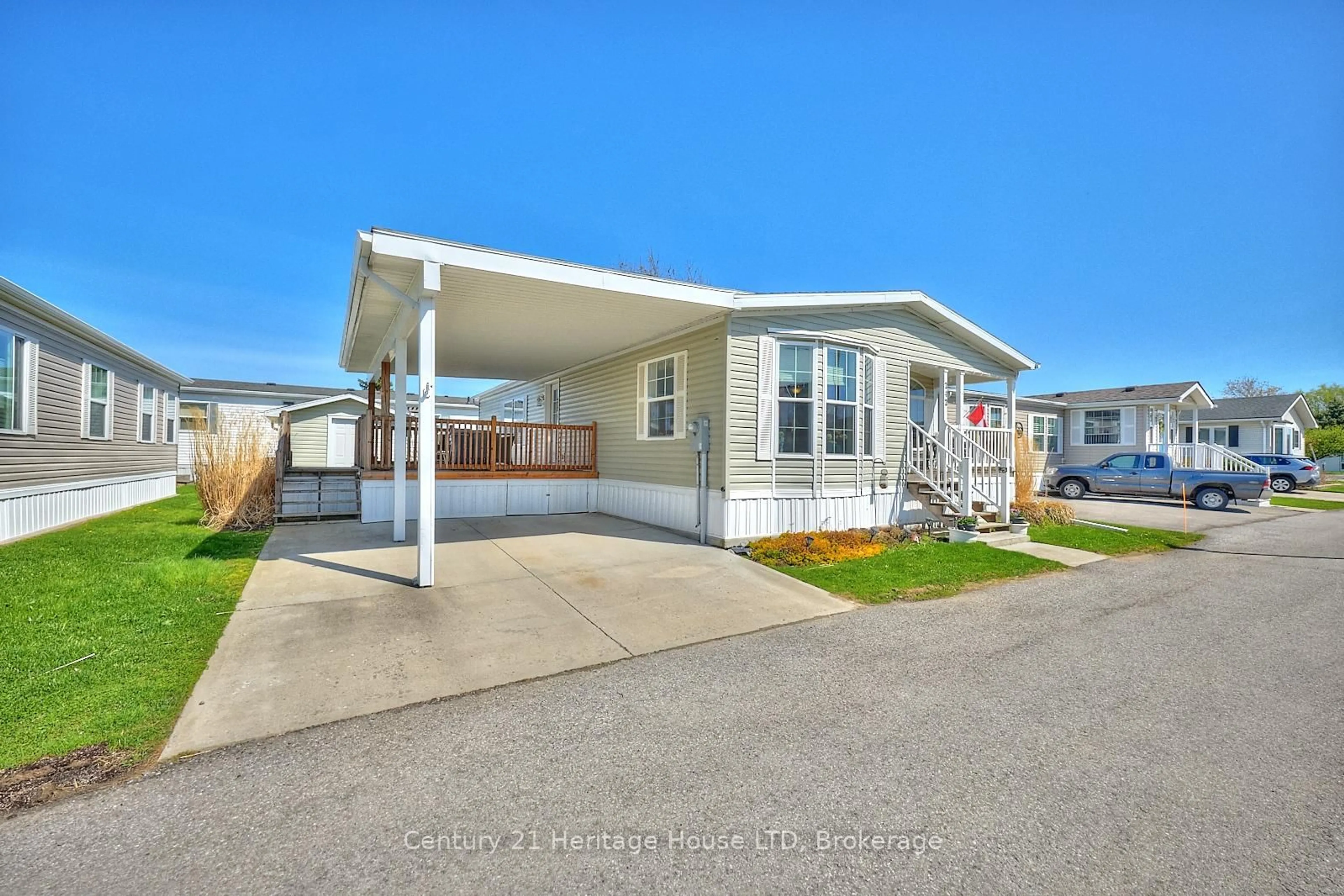 Home with vinyl exterior material, street for 3033 Townline Rd #242, Fort Erie Ontario L0S 1S1