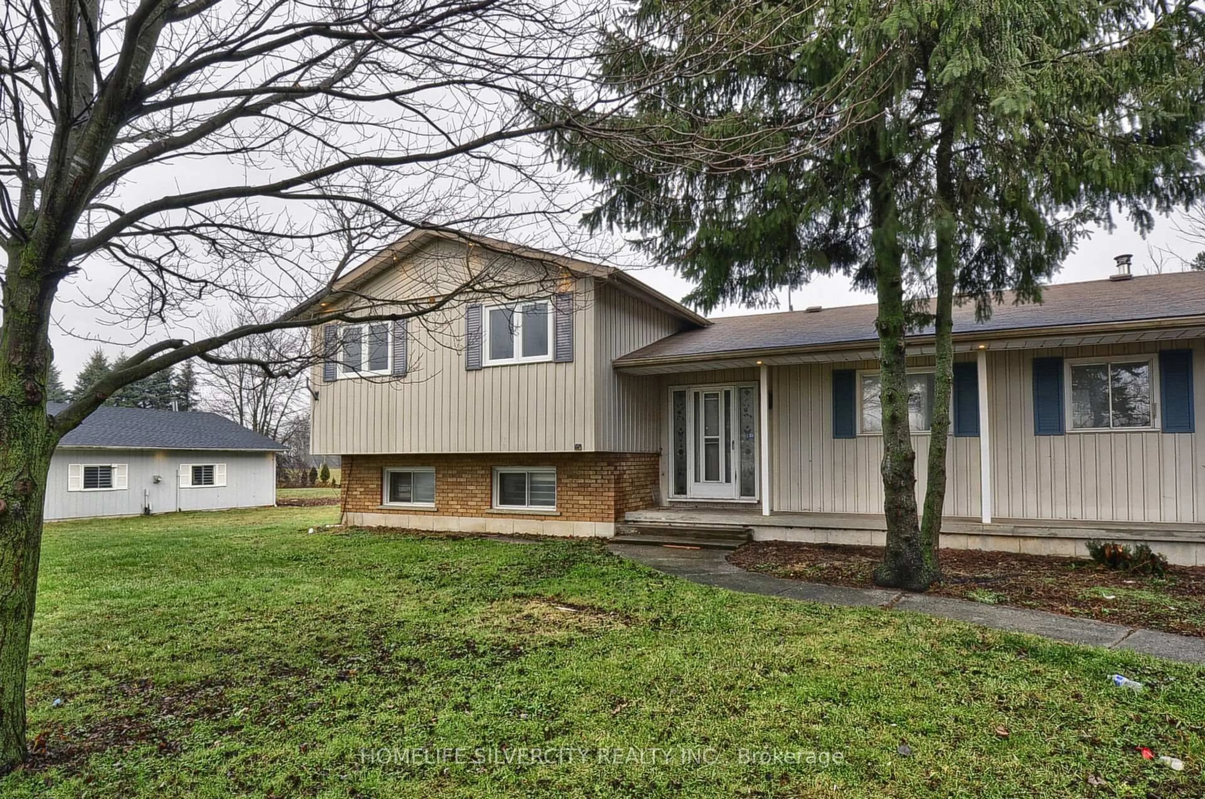 Home with vinyl exterior material, street for 24 Sour Springs Rd, Brantford Ontario N0E 1K0