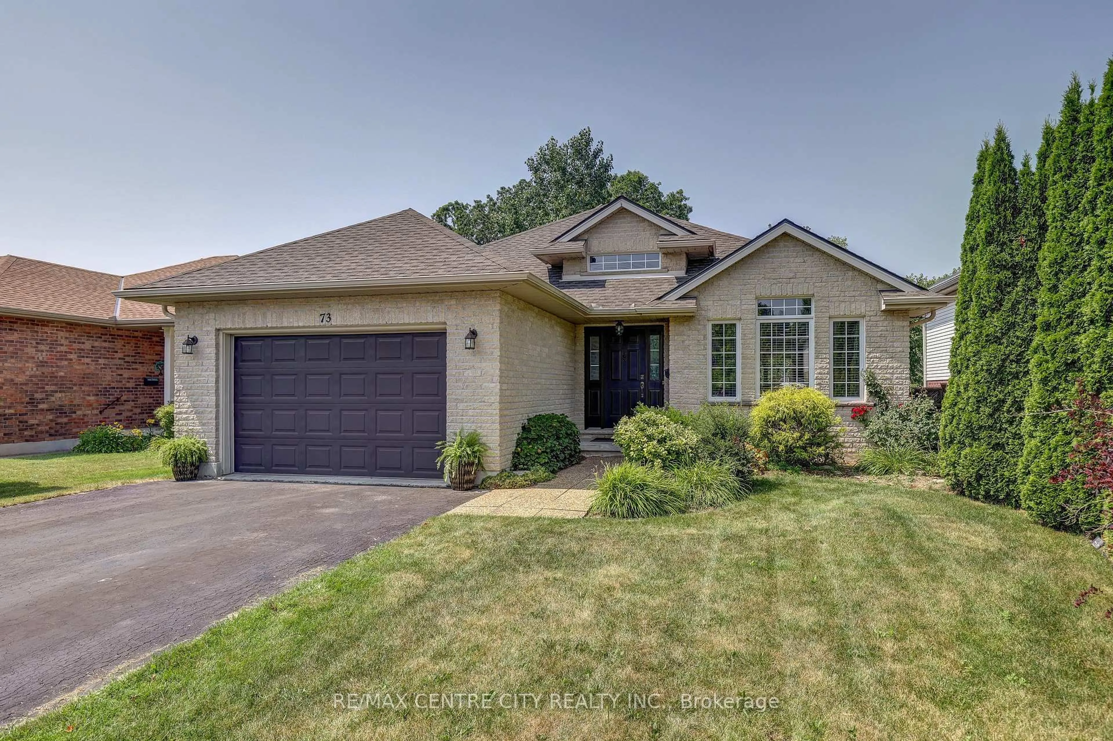Home with brick exterior material, street for 73 Greenway Blvd, St. Thomas Ontario N5P 4P8