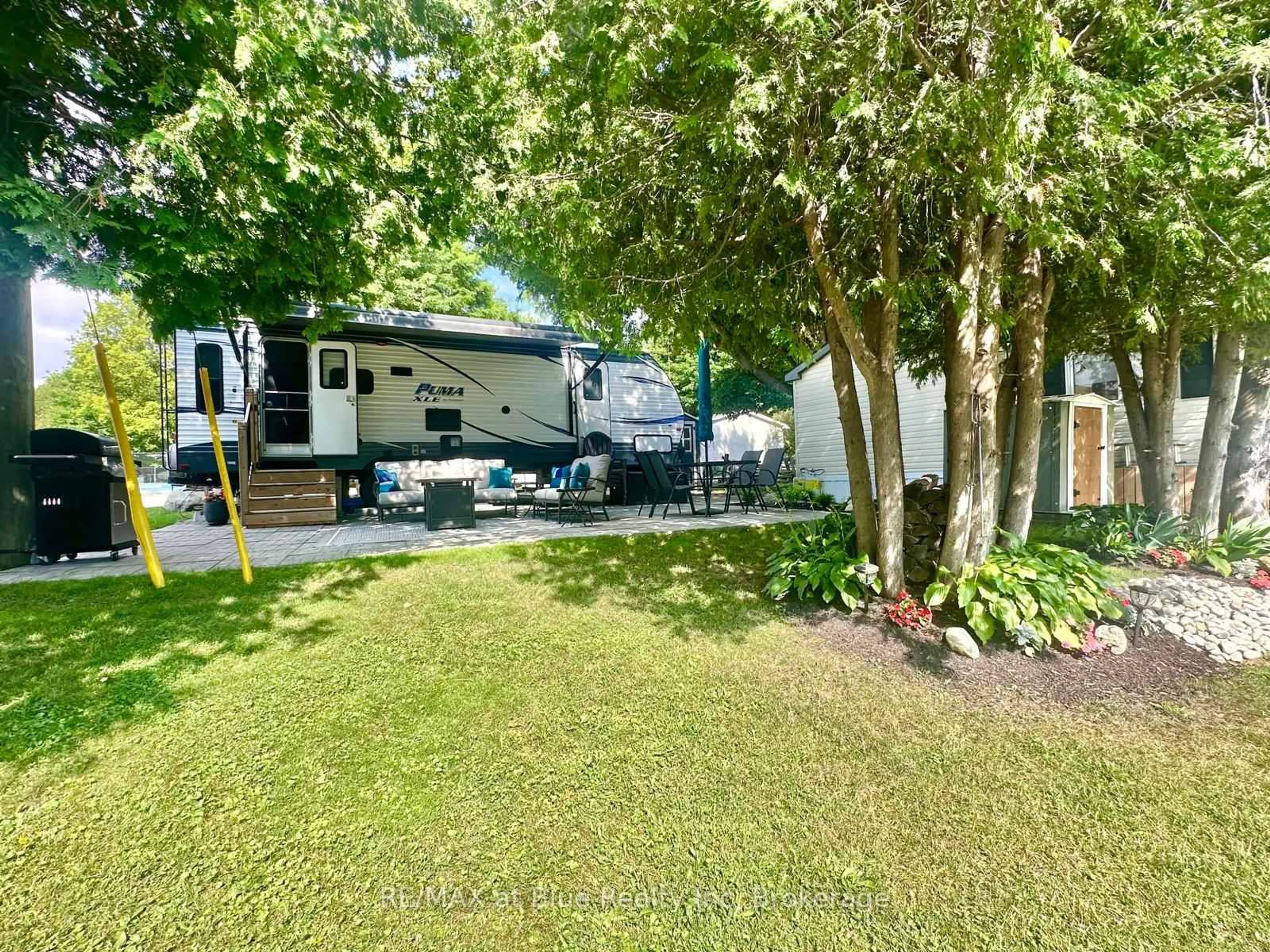 A pic from outside/outdoor area/front of a property/back of a property/a pic from drone, unknown for 7489 SIDEROAD 5 E #E 4, Wellington North Ontario N0G 2L0