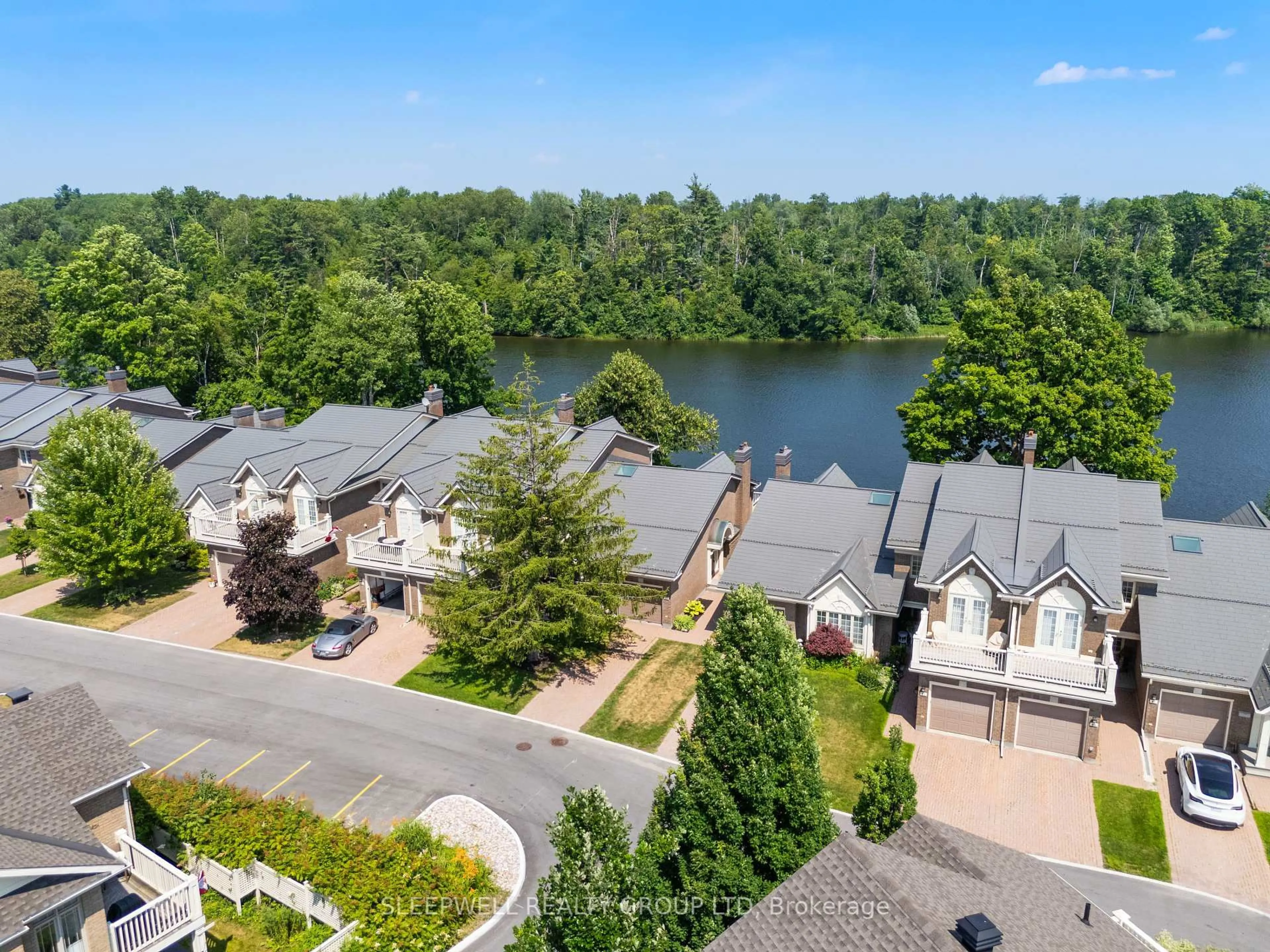 A pic from outside/outdoor area/front of a property/back of a property/a pic from drone, water/lake/river/ocean view for 55 Waterford Dr, Ottawa Ontario K2E 7V4
