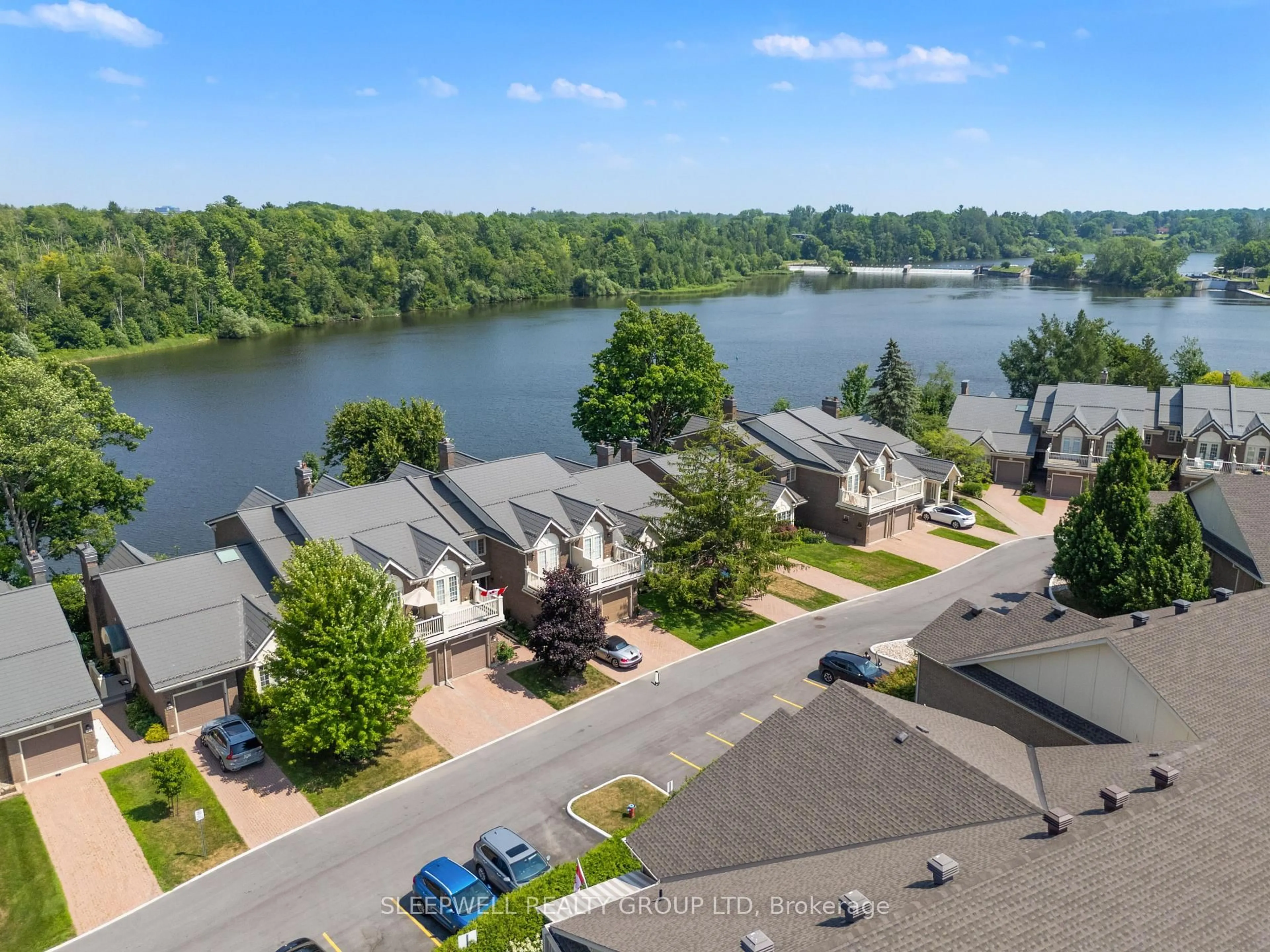 A pic from outside/outdoor area/front of a property/back of a property/a pic from drone, water/lake/river/ocean view for 55 Waterford Dr, Ottawa Ontario K2E 7V4