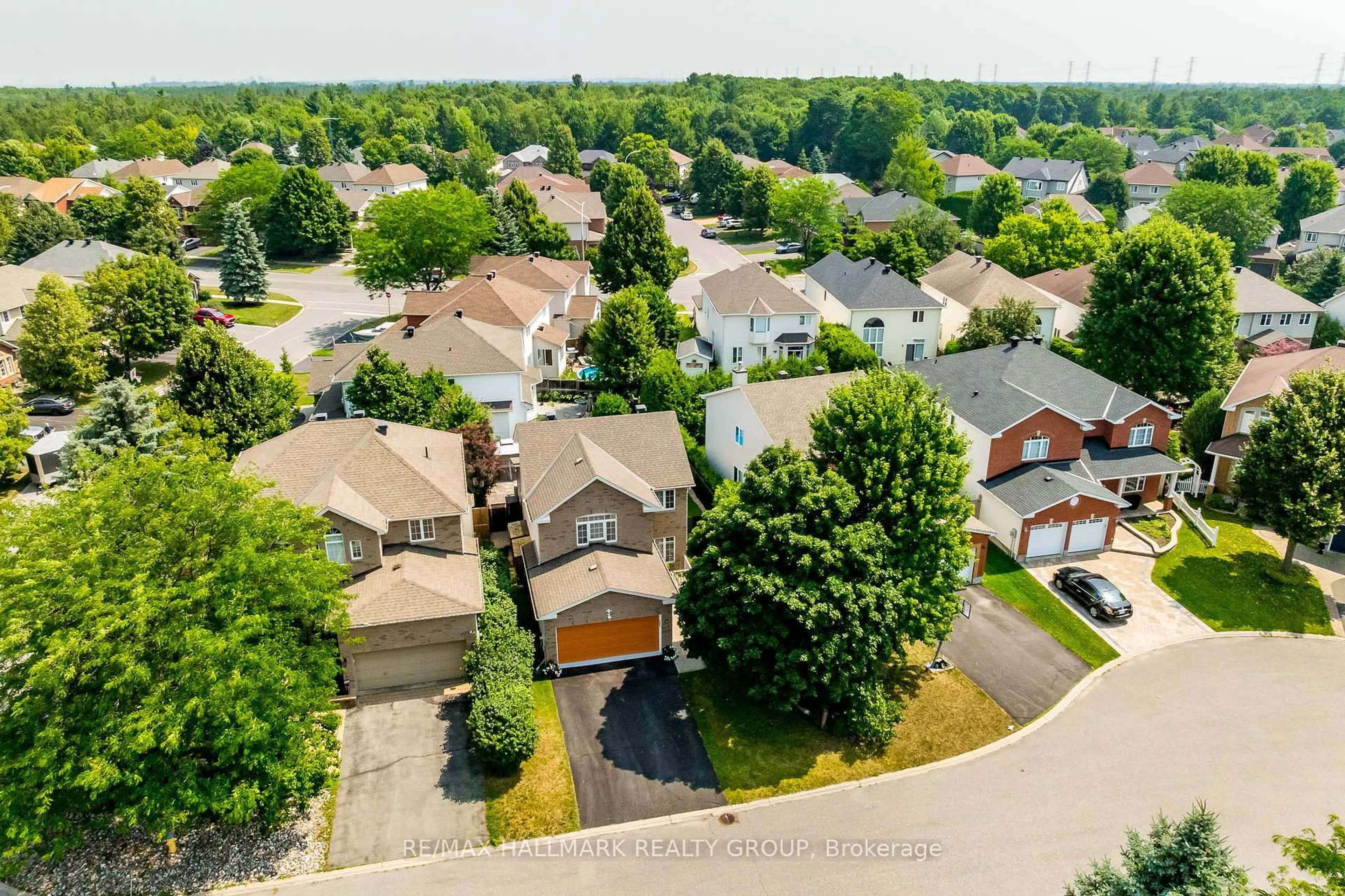 A pic from outside/outdoor area/front of a property/back of a property/a pic from drone, street for 4 Gros Morne Crt, Ottawa Ontario K2M 2W7