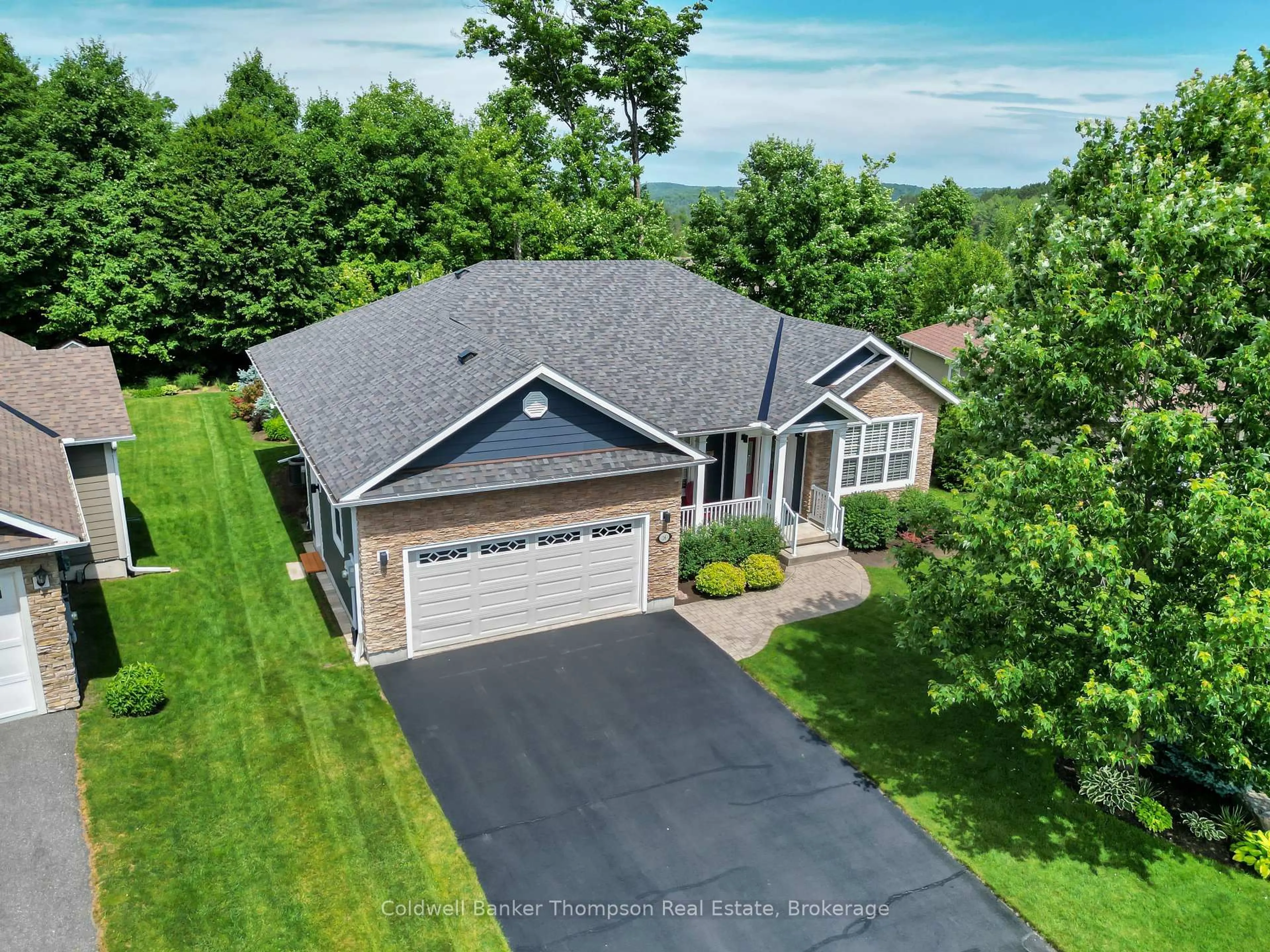 A pic from outside/outdoor area/front of a property/back of a property/a pic from drone, unknown for 16 Homestead Lane, Huntsville Ontario P1H 2N8