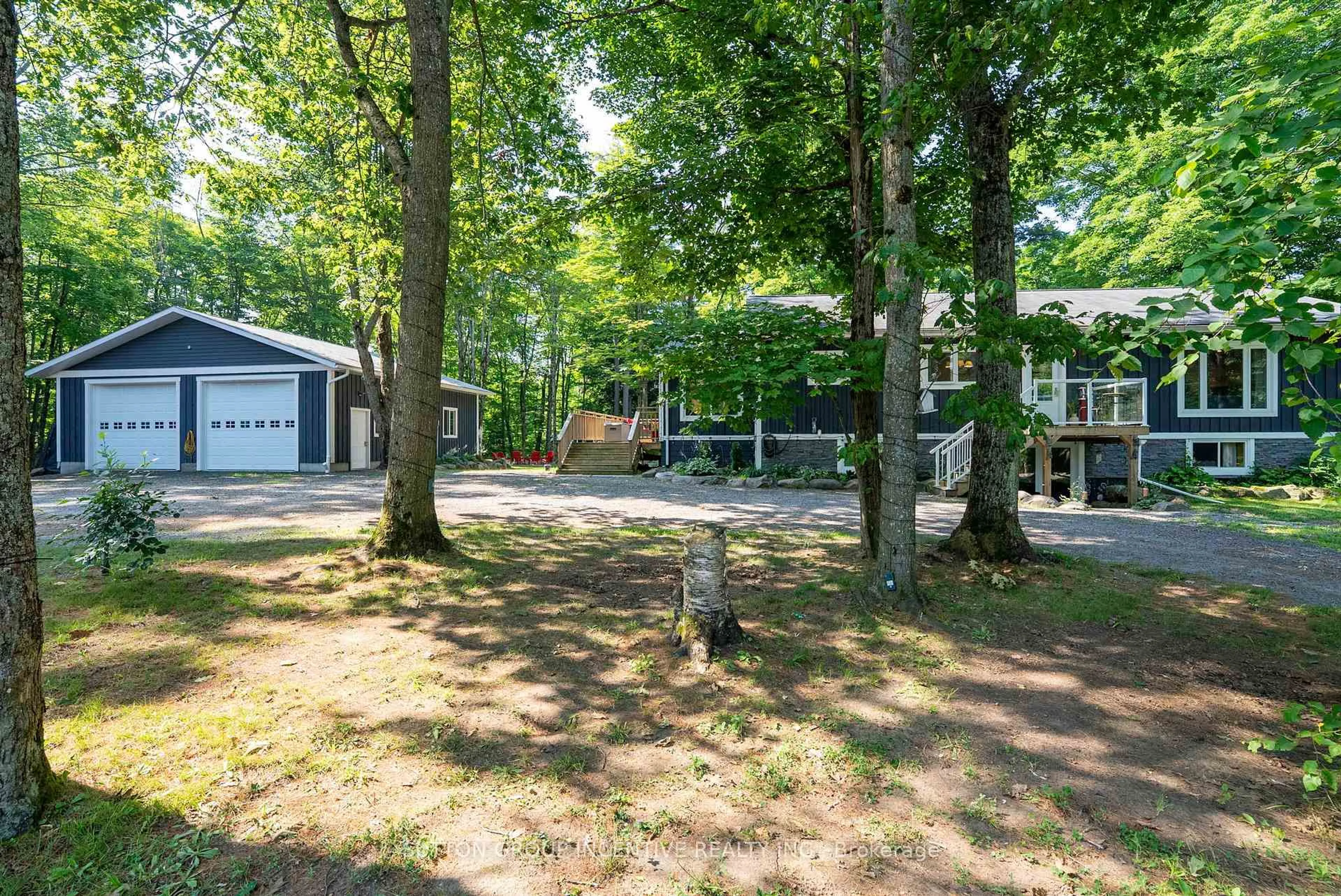 A pic from outside/outdoor area/front of a property/back of a property/a pic from drone, forest/trees view for 333 Rankin Lake Rd, Seguin Ontario P2A 2W8
