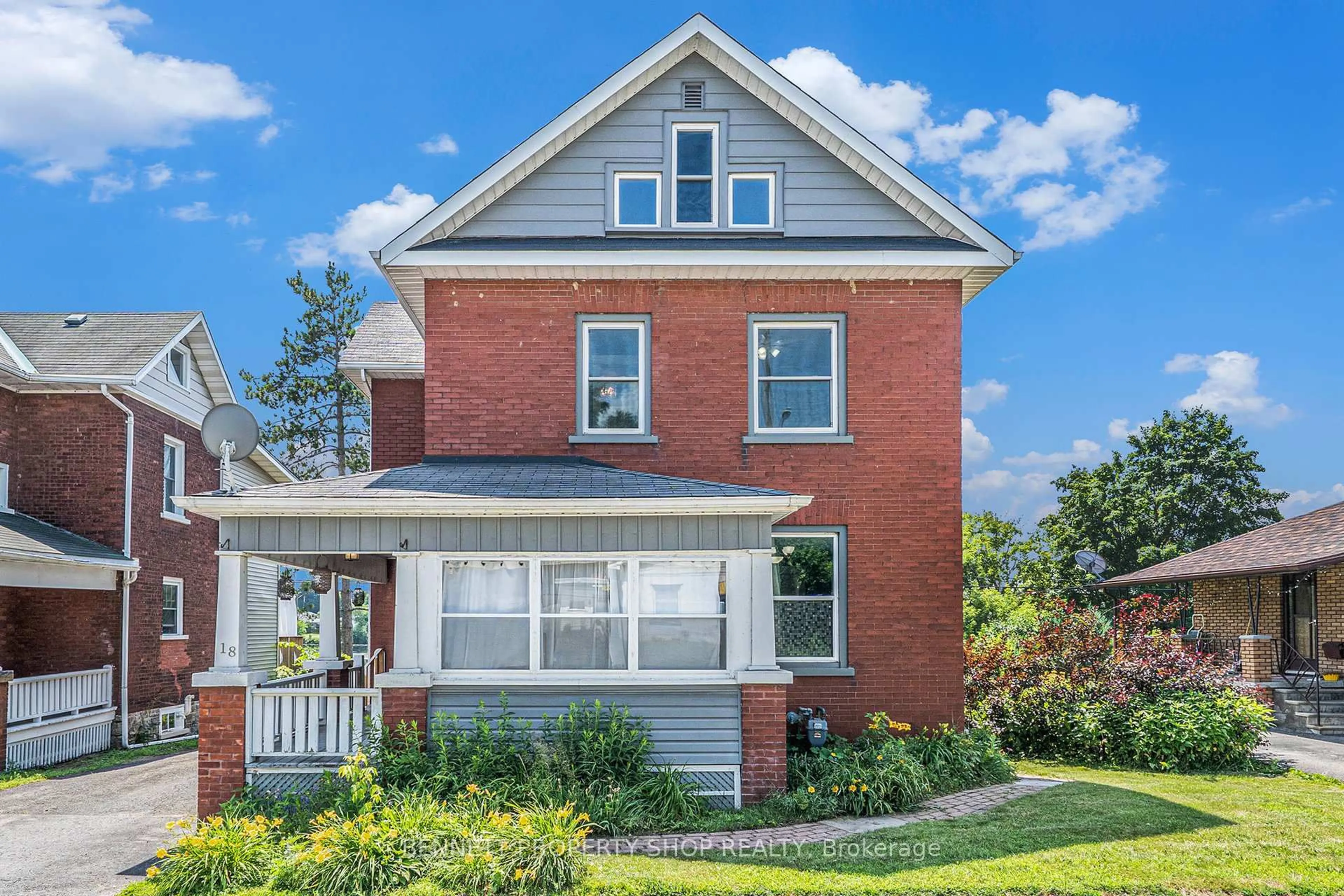 Home with brick exterior material, street for 18 Queen St, Smiths Falls Ontario K7A 3N2