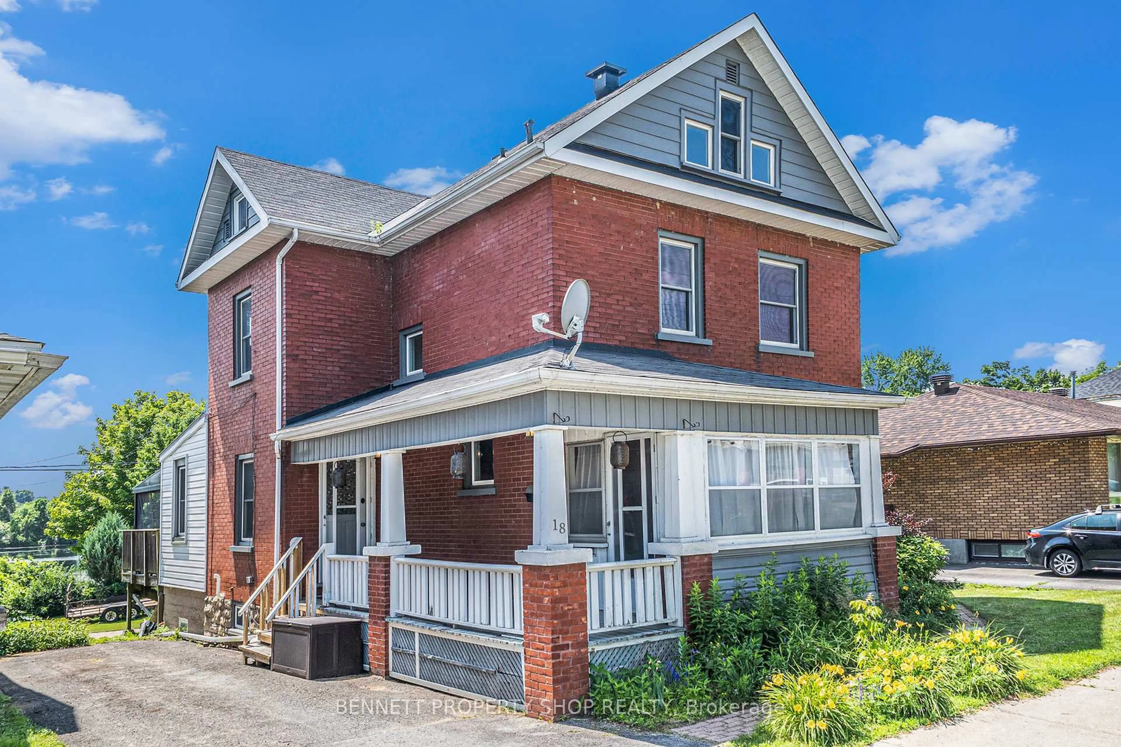 Home with brick exterior material, street for 18 Queen St, Smiths Falls Ontario K7A 3N2