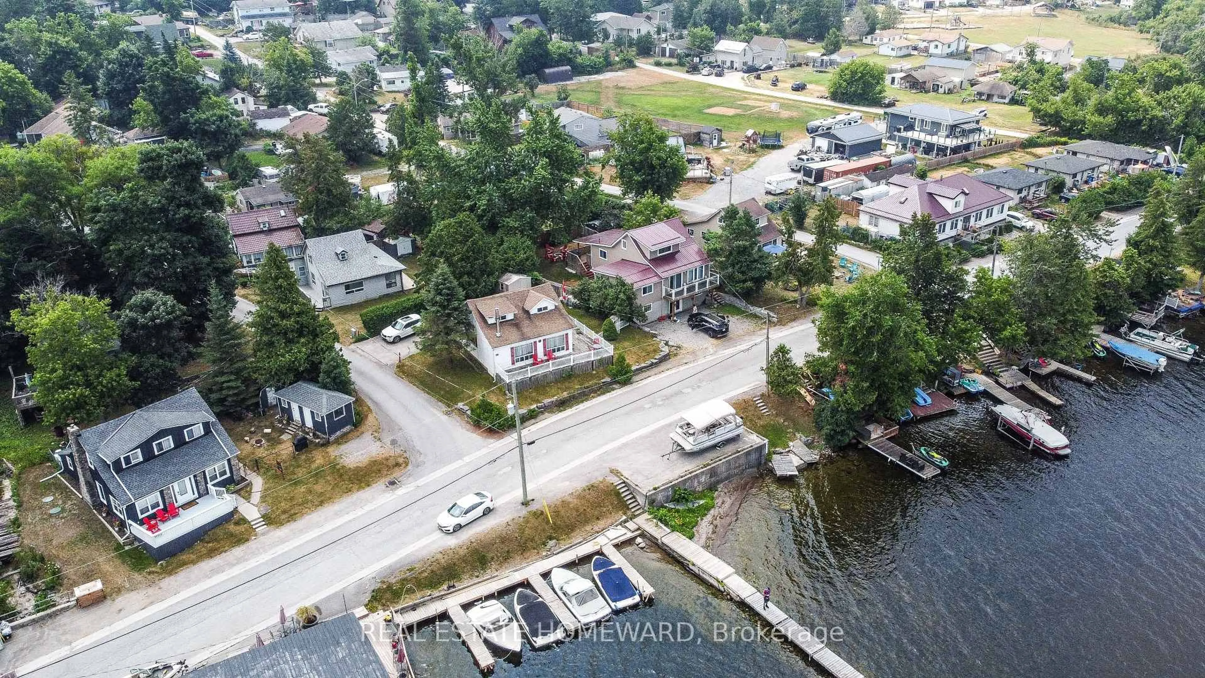 A pic from outside/outdoor area/front of a property/back of a property/a pic from drone, water/lake/river/ocean view for 115 Hazel St, Kawartha Lakes Ontario K0M 1L0