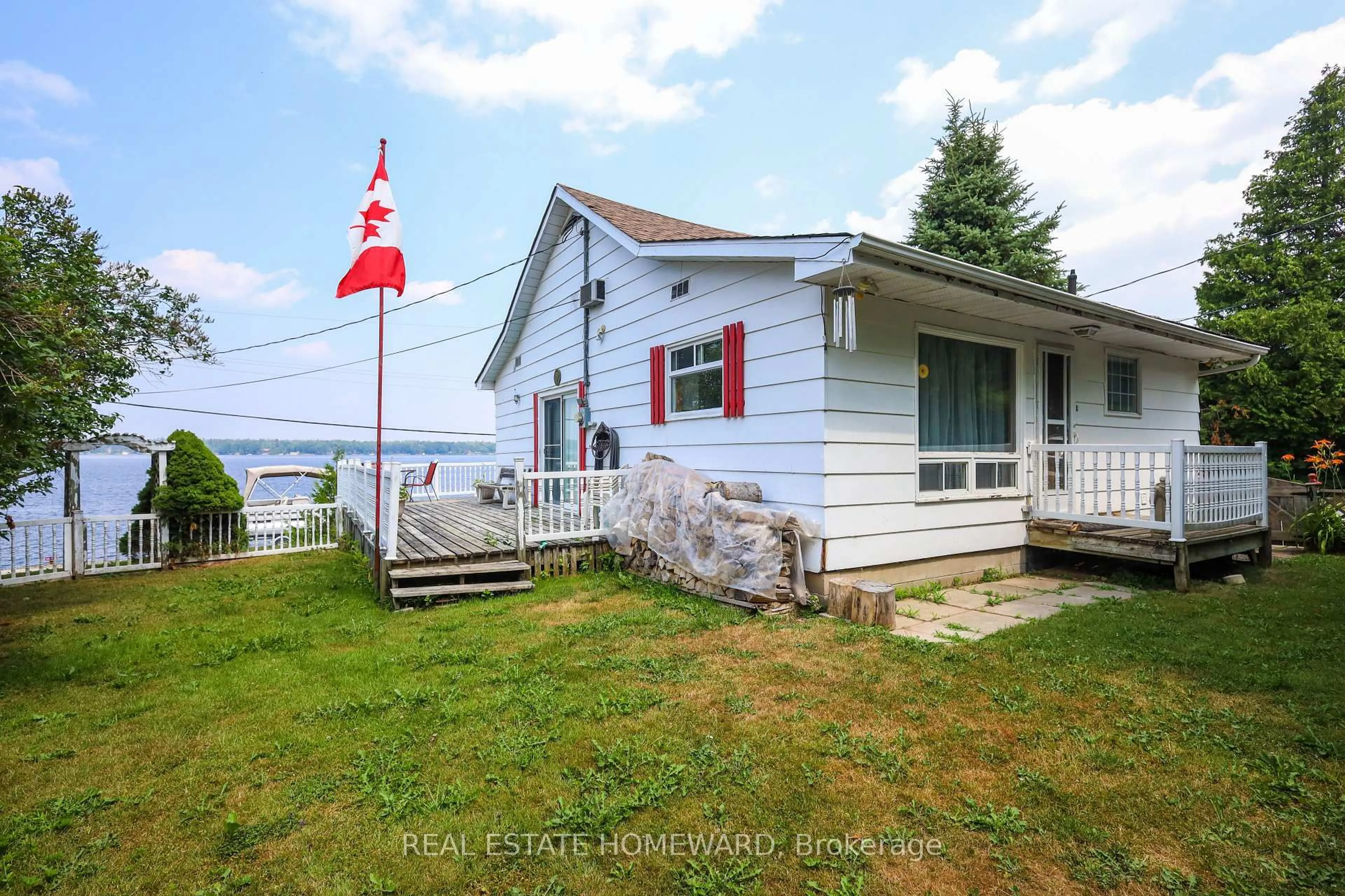 A pic from outside/outdoor area/front of a property/back of a property/a pic from drone, water/lake/river/ocean view for 115 Hazel St, Kawartha Lakes Ontario K0M 1L0