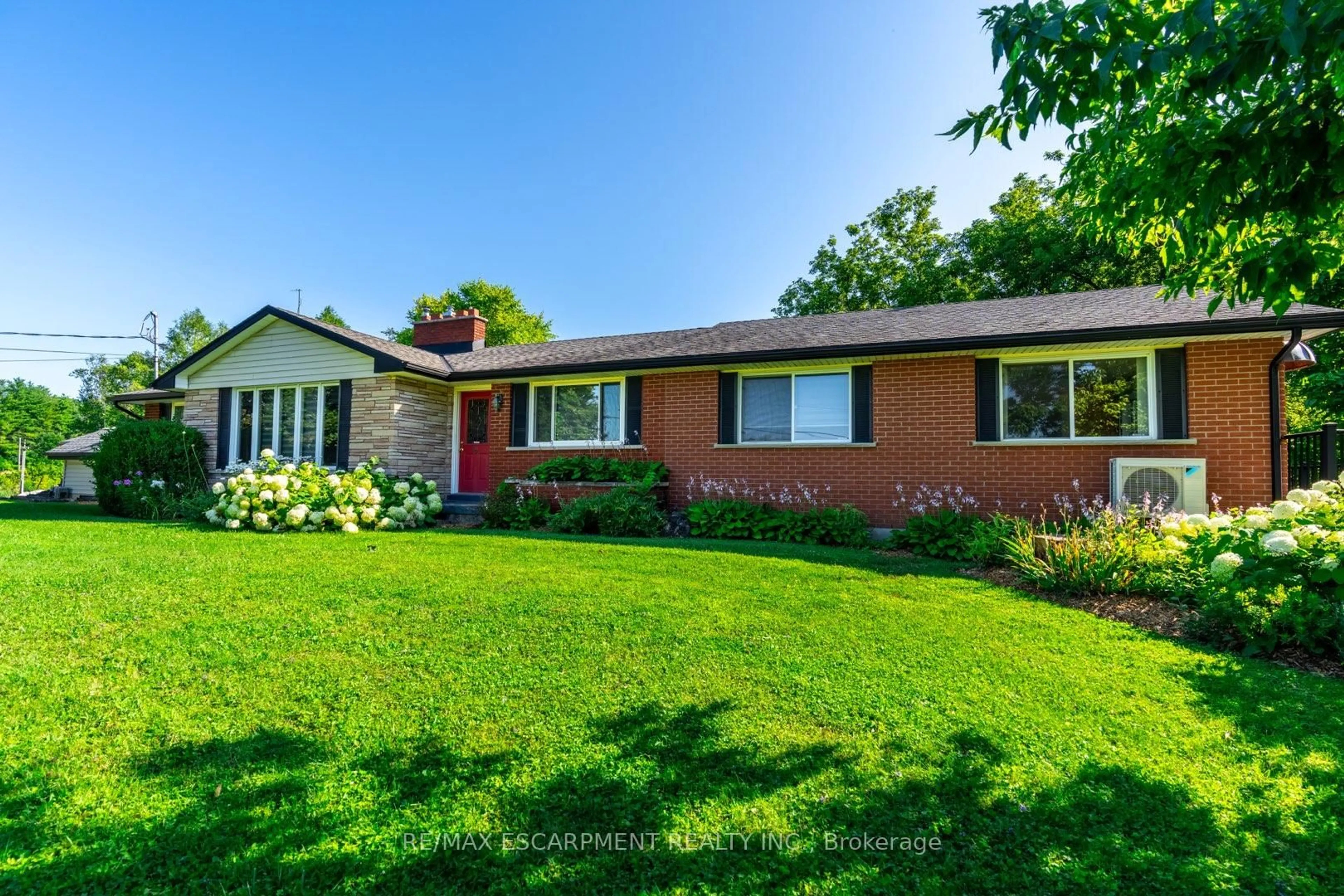 Home with brick exterior material, street for 2172 CENTRE Rd, Hamilton Ontario L0P 1B0