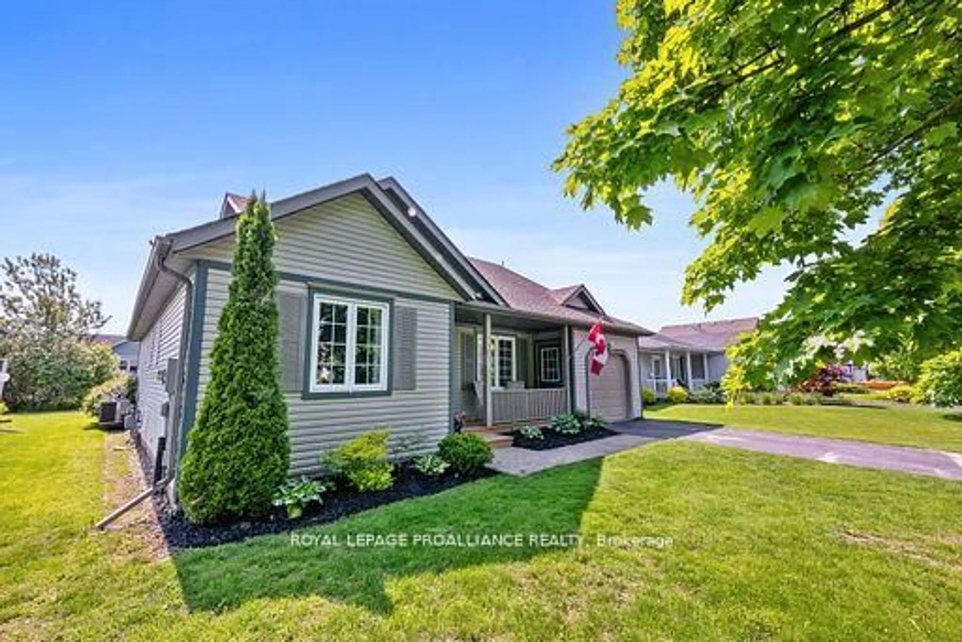 Home with vinyl exterior material, street for 22 Mills Rd, Brighton Ontario K0K 1H0