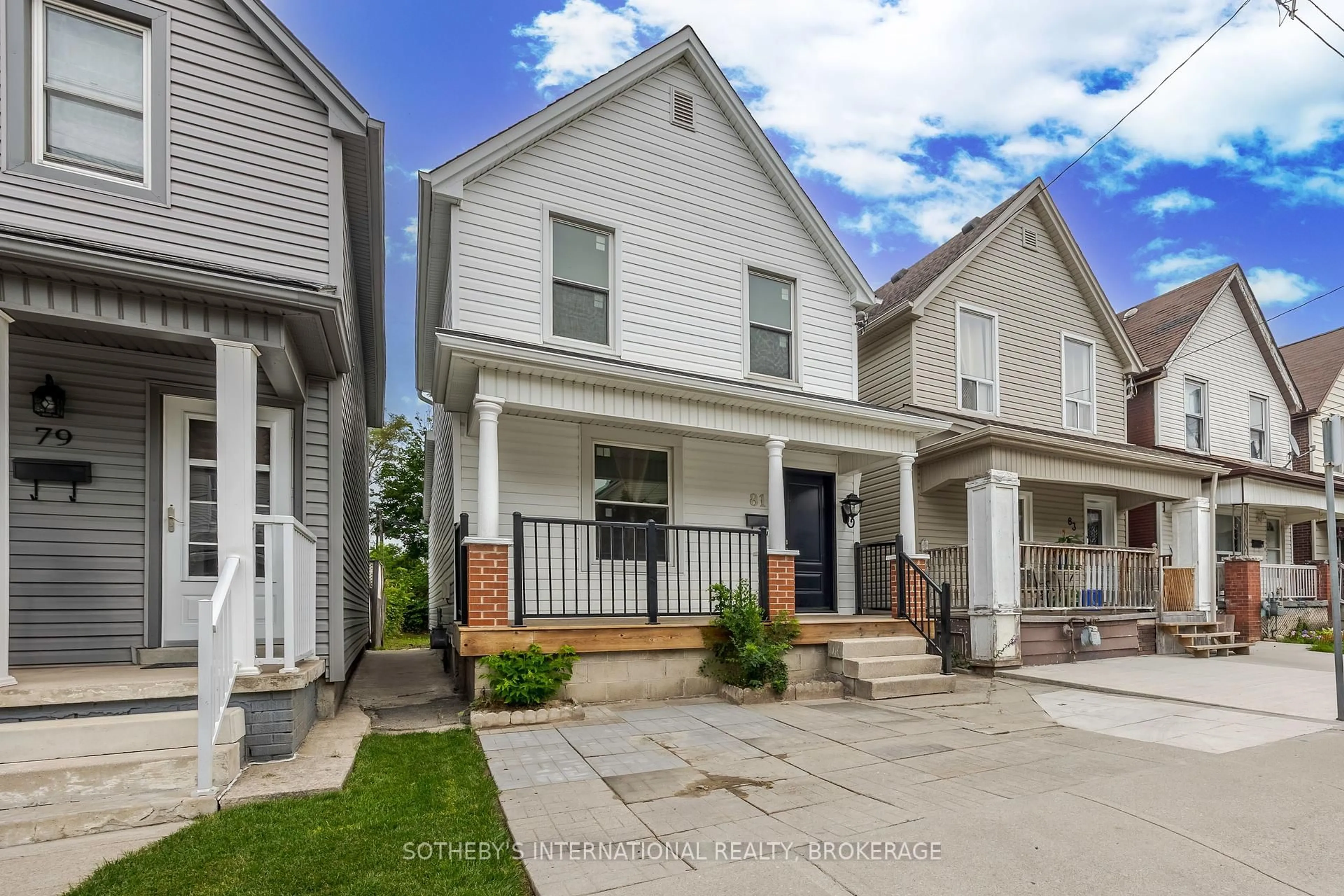 Home with vinyl exterior material, street for 81 Clinton St, Hamilton Ontario L8L 3K1