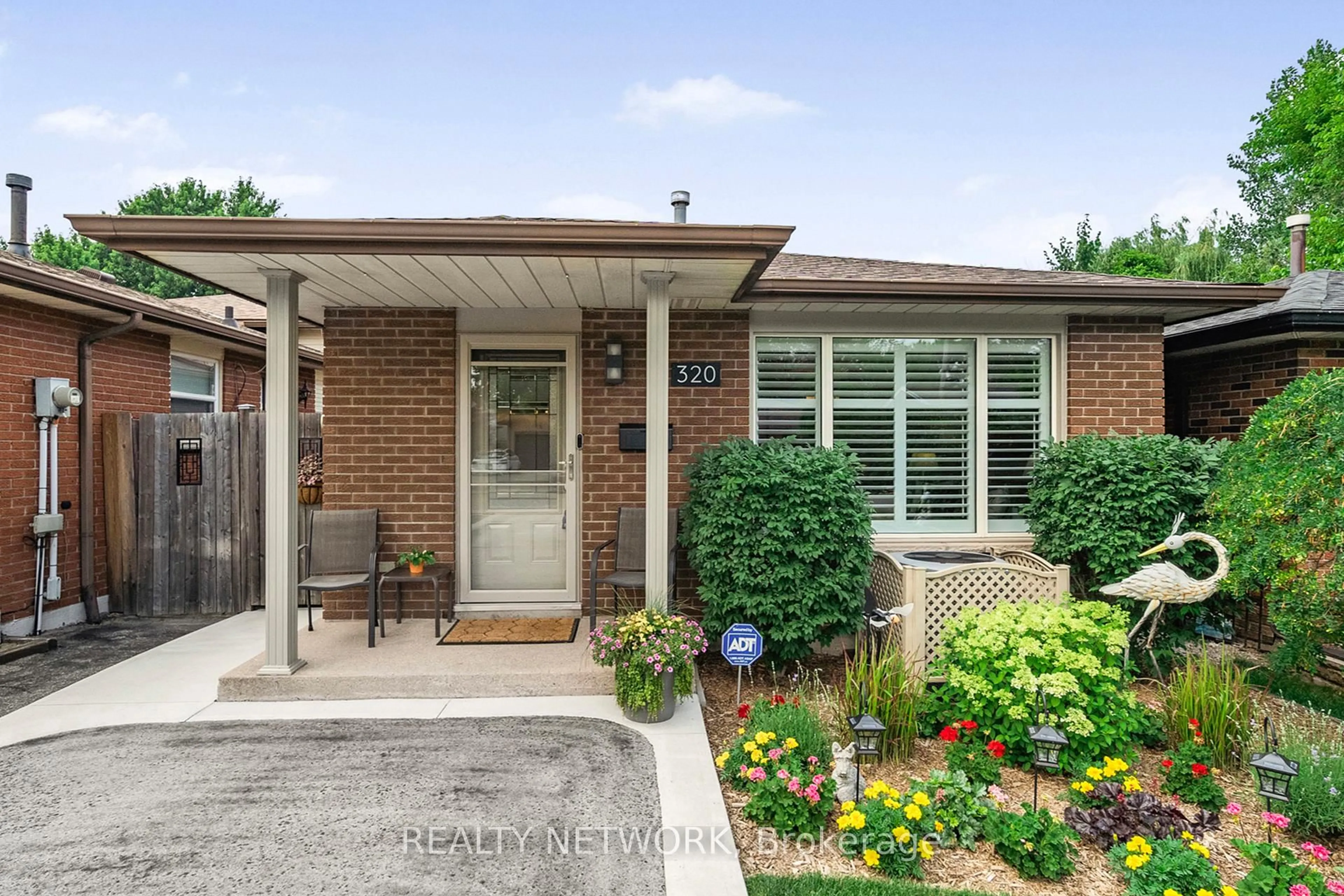 Home with brick exterior material, street for 320 East 24th St, Hamilton Ontario L8V 2Y6