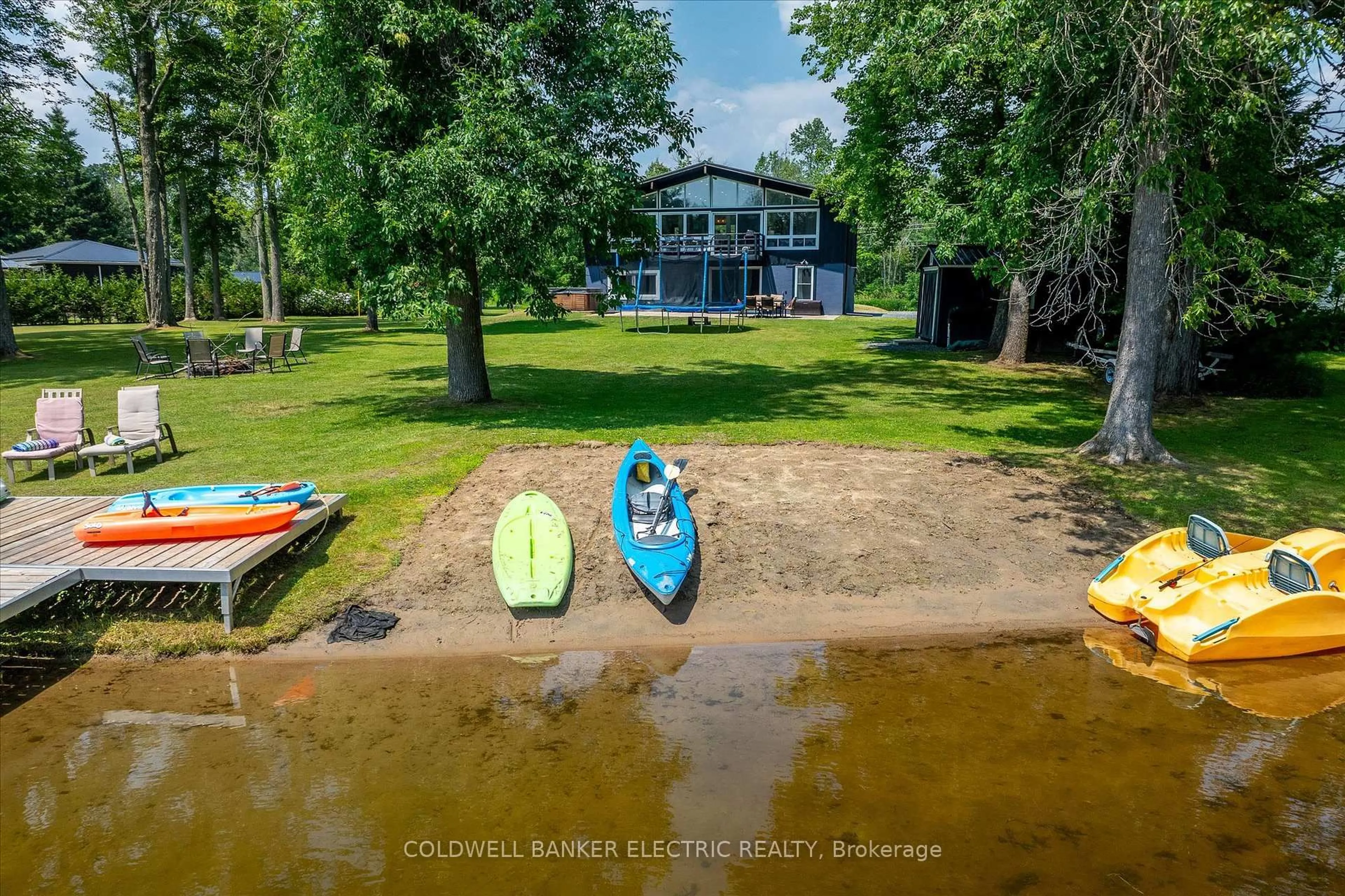 A pic from outside/outdoor area/front of a property/back of a property/a pic from drone, water/lake/river/ocean view for 228 River Garden Rd, Limoges Ontario K0K 2M0