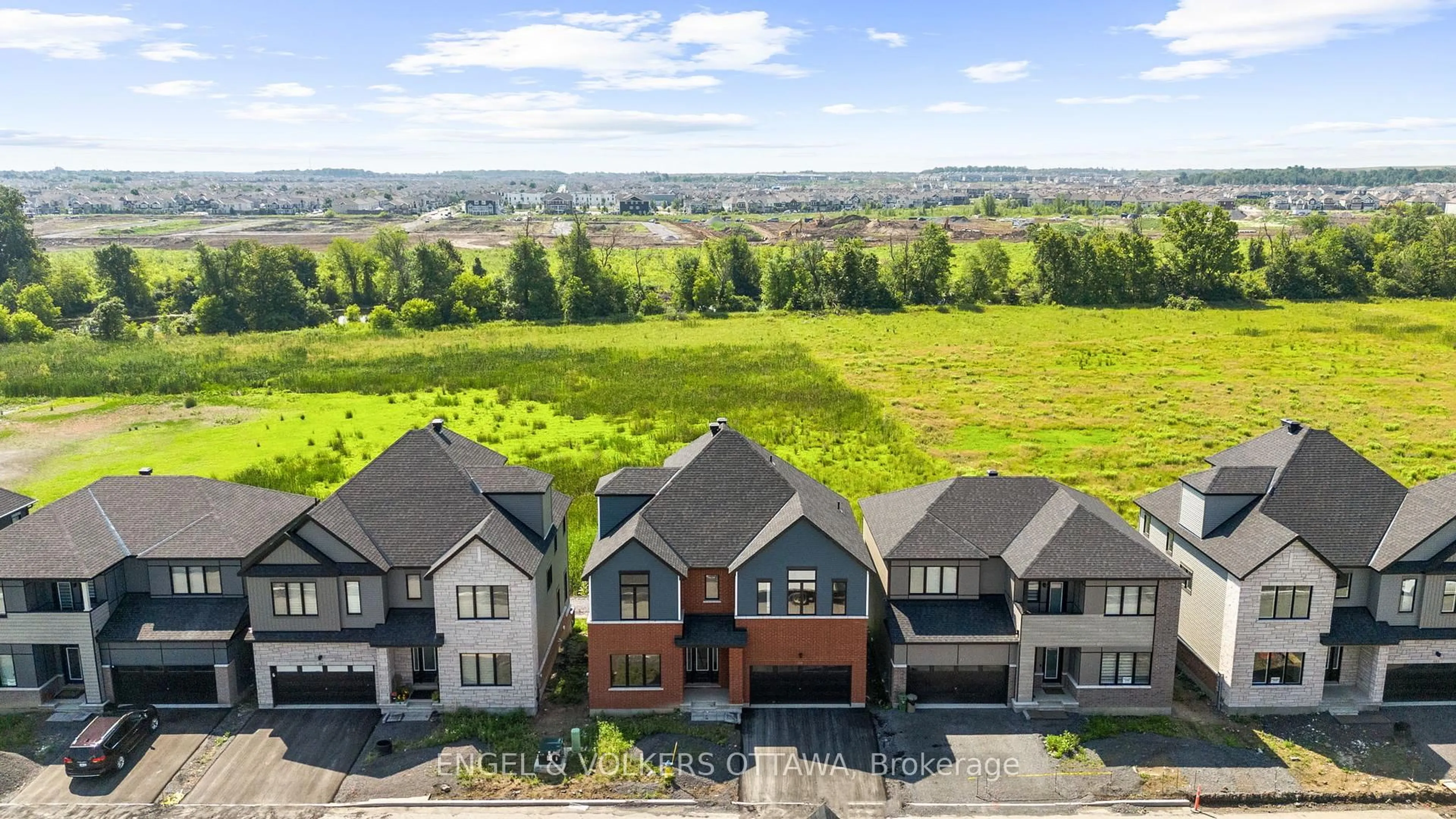 A pic from outside/outdoor area/front of a property/back of a property/a pic from drone, mountain view for 539 Elation Hts, Ottawa Ontario K2J 4J4