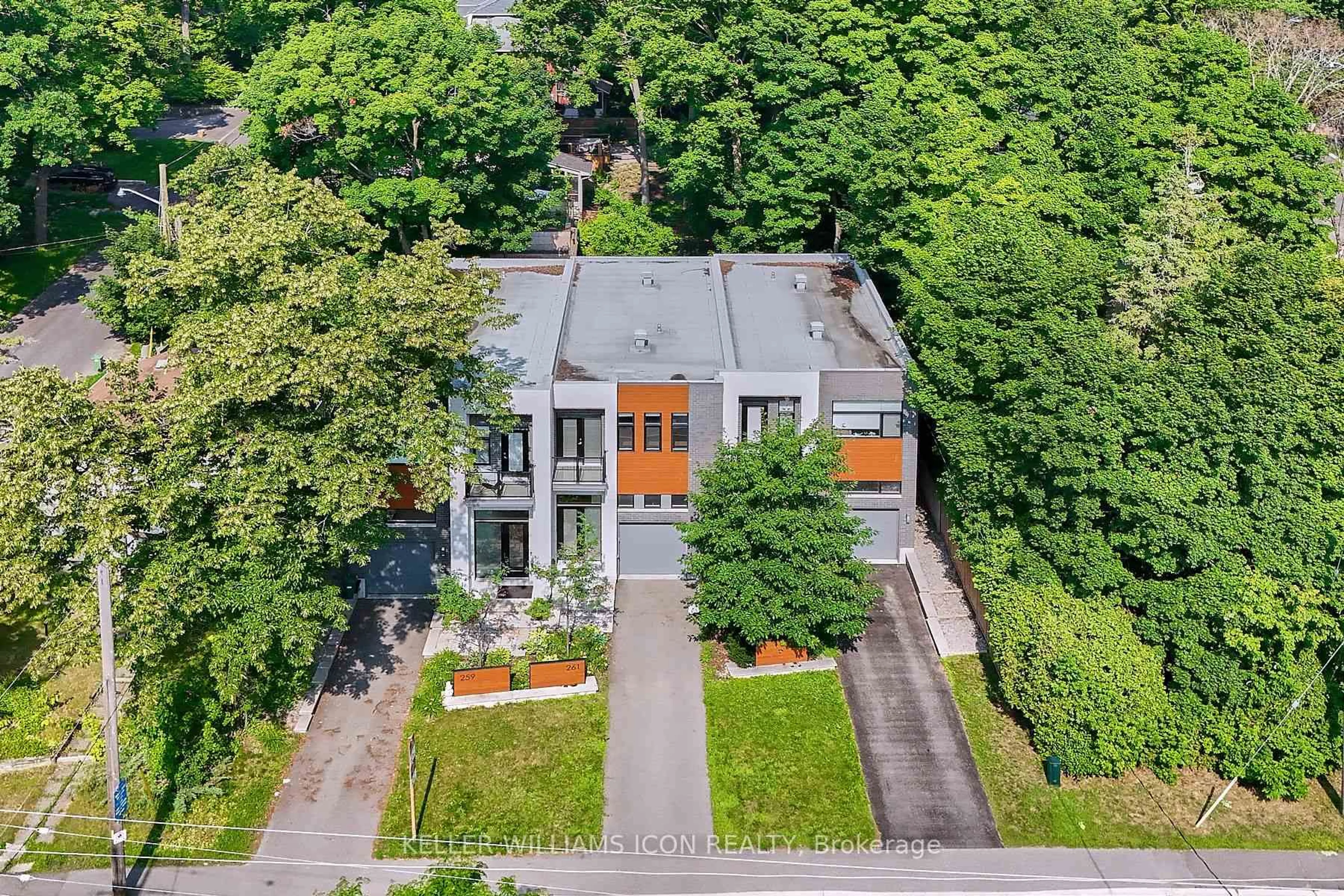 A pic from outside/outdoor area/front of a property/back of a property/a pic from drone, street for 261 Beechwood Ave, Ottawa Ontario K1M 1K6