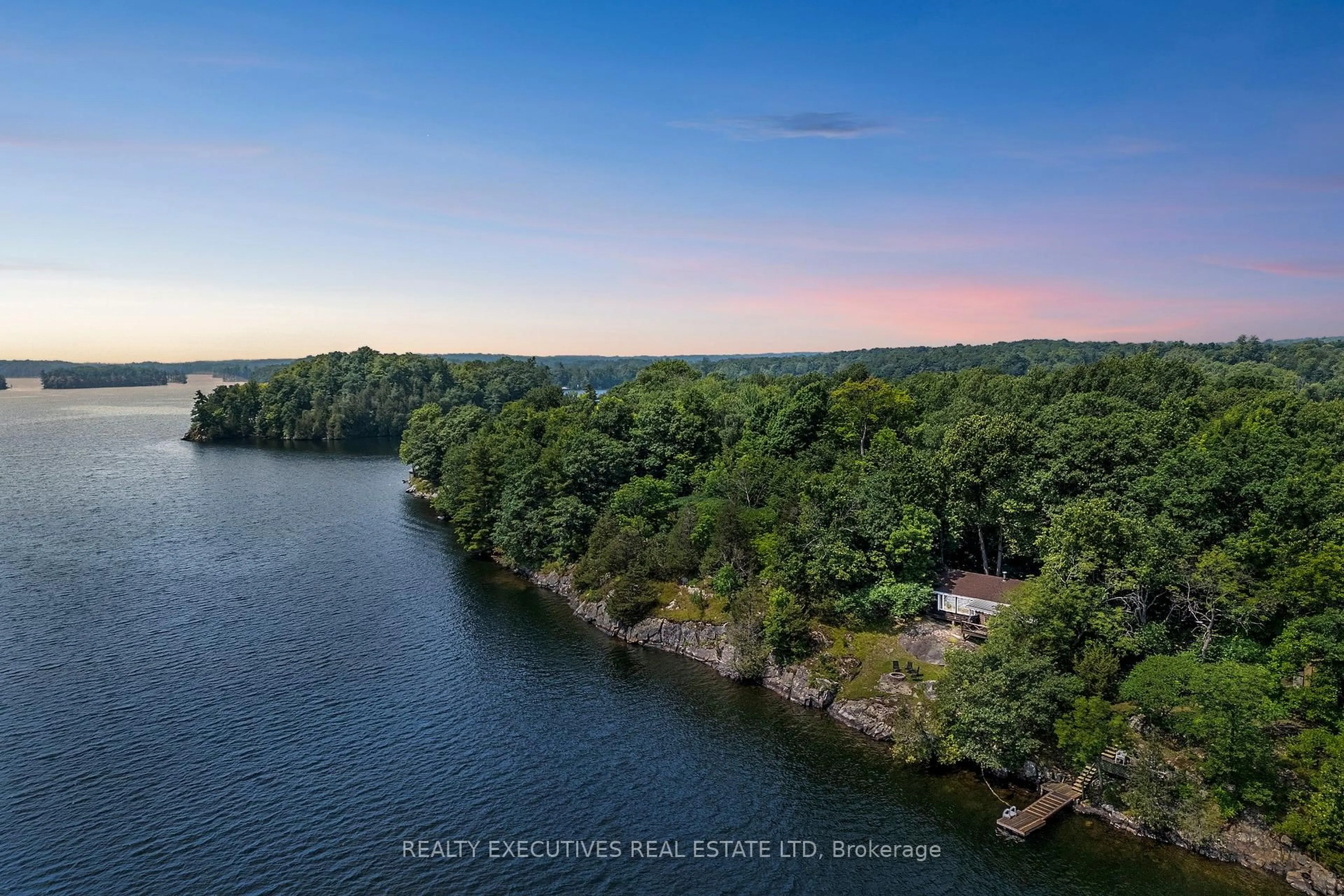 A pic from outside/outdoor area/front of a property/back of a property/a pic from drone, water/lake/river/ocean view for 69 Partridge Lane, Maberly Ontario K0H 2B0