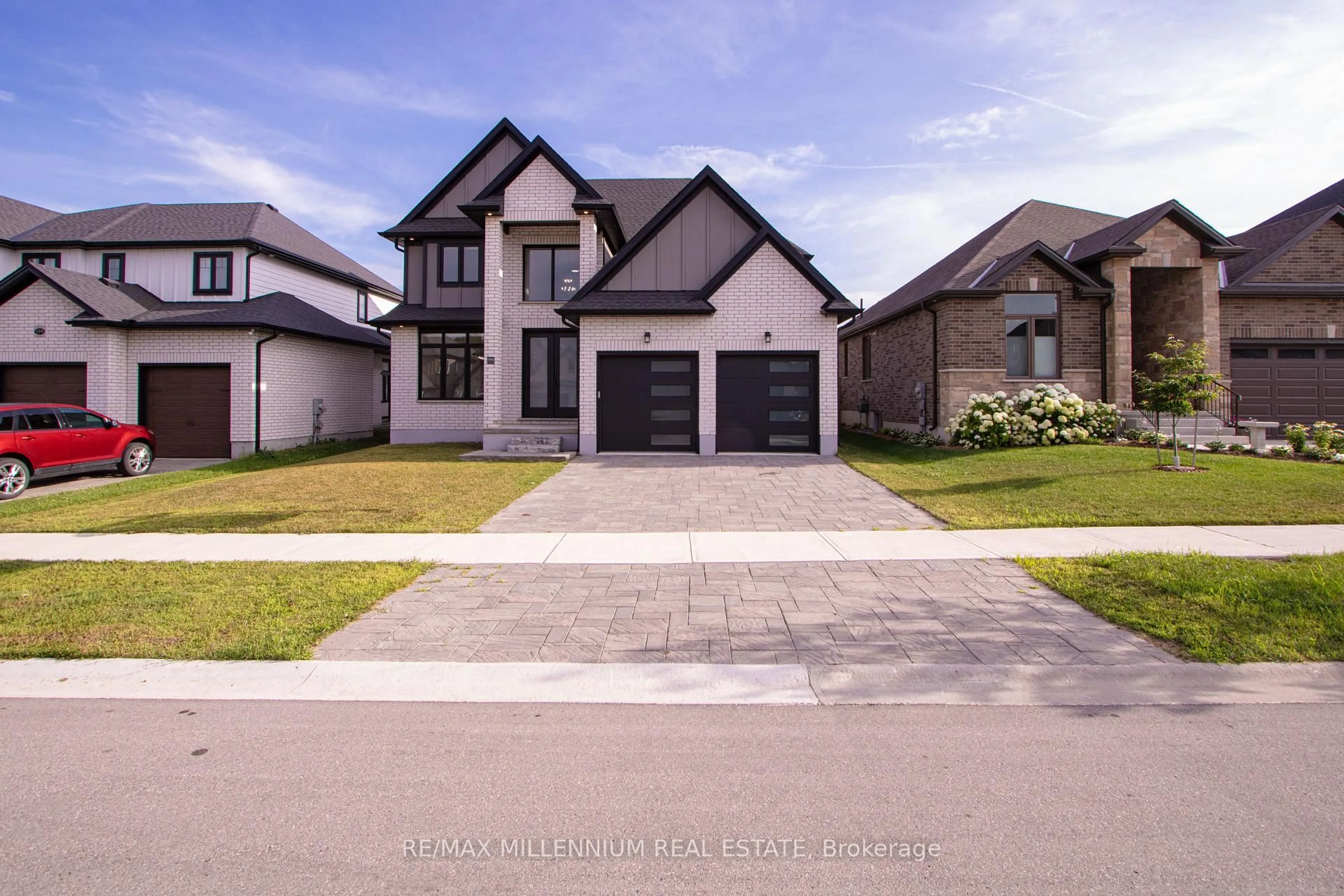 Home with brick exterior material, street for 195 Boardwalk Way, Thames Centre Ontario N0L 1G2