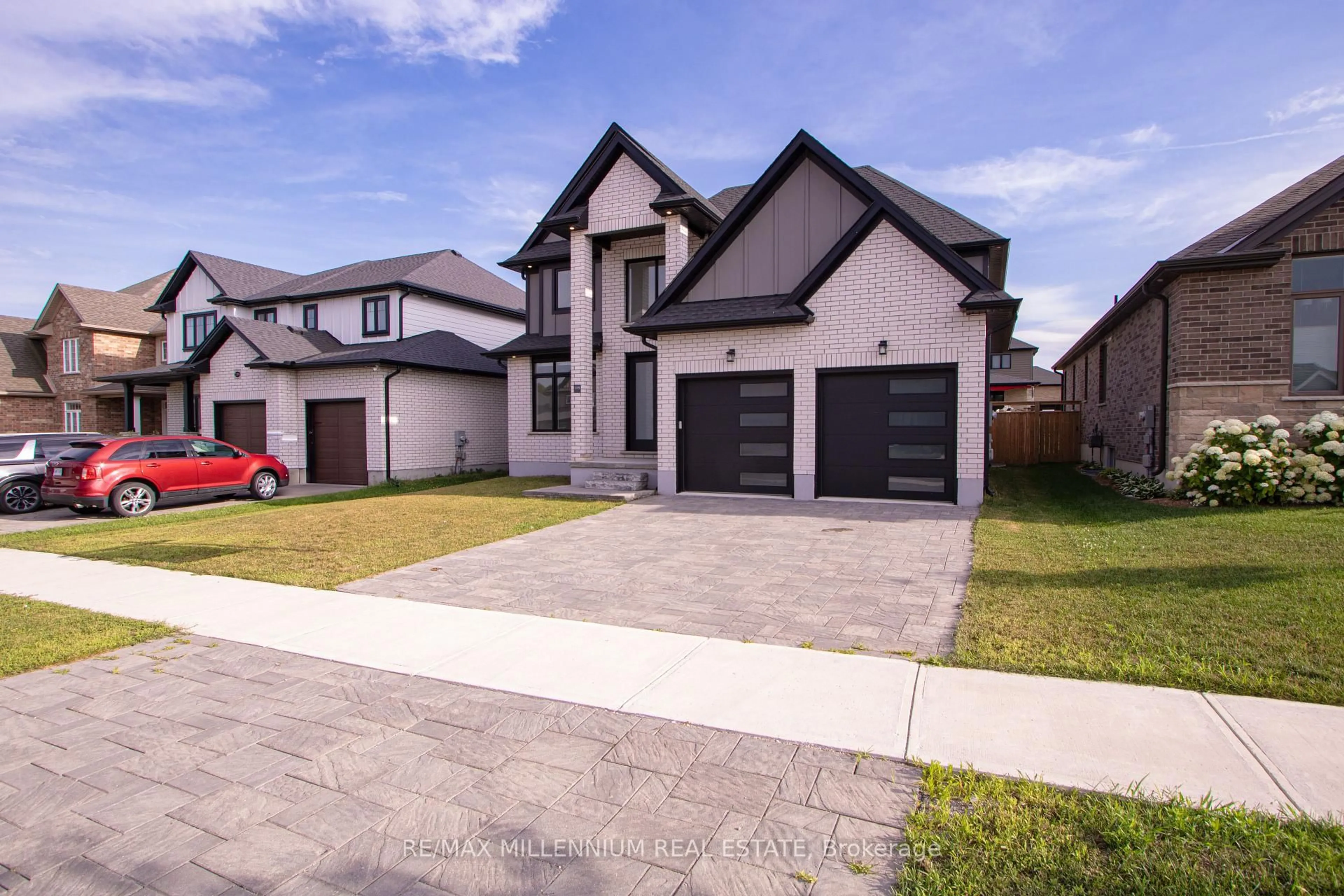 Home with brick exterior material, street for 195 Boardwalk Way, Thames Centre Ontario N0L 1G2
