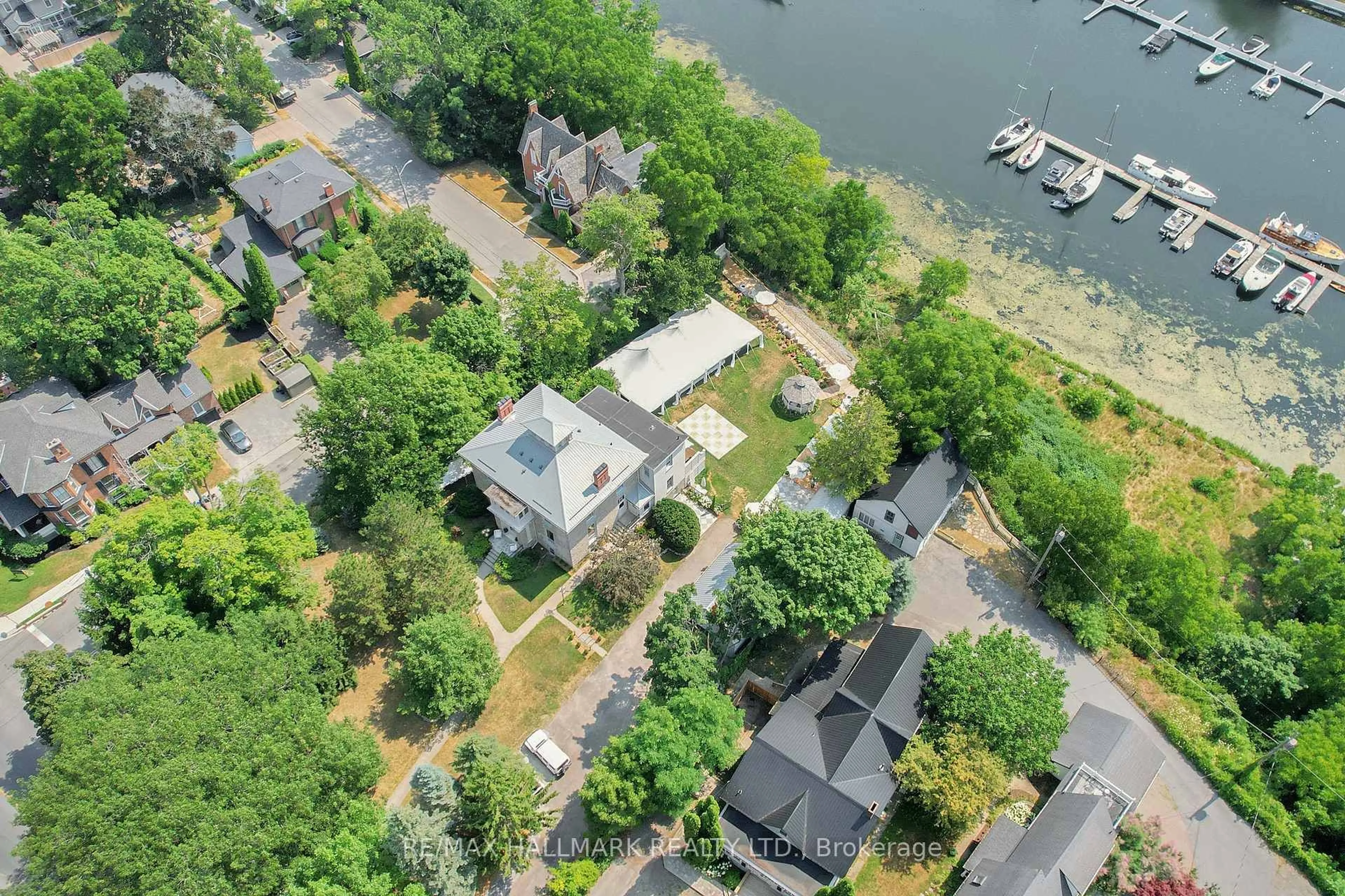 A pic from outside/outdoor area/front of a property/back of a property/a pic from drone, water/lake/river/ocean view for 346 Picton Main St, Prince Edward County Ontario K0K 2T0