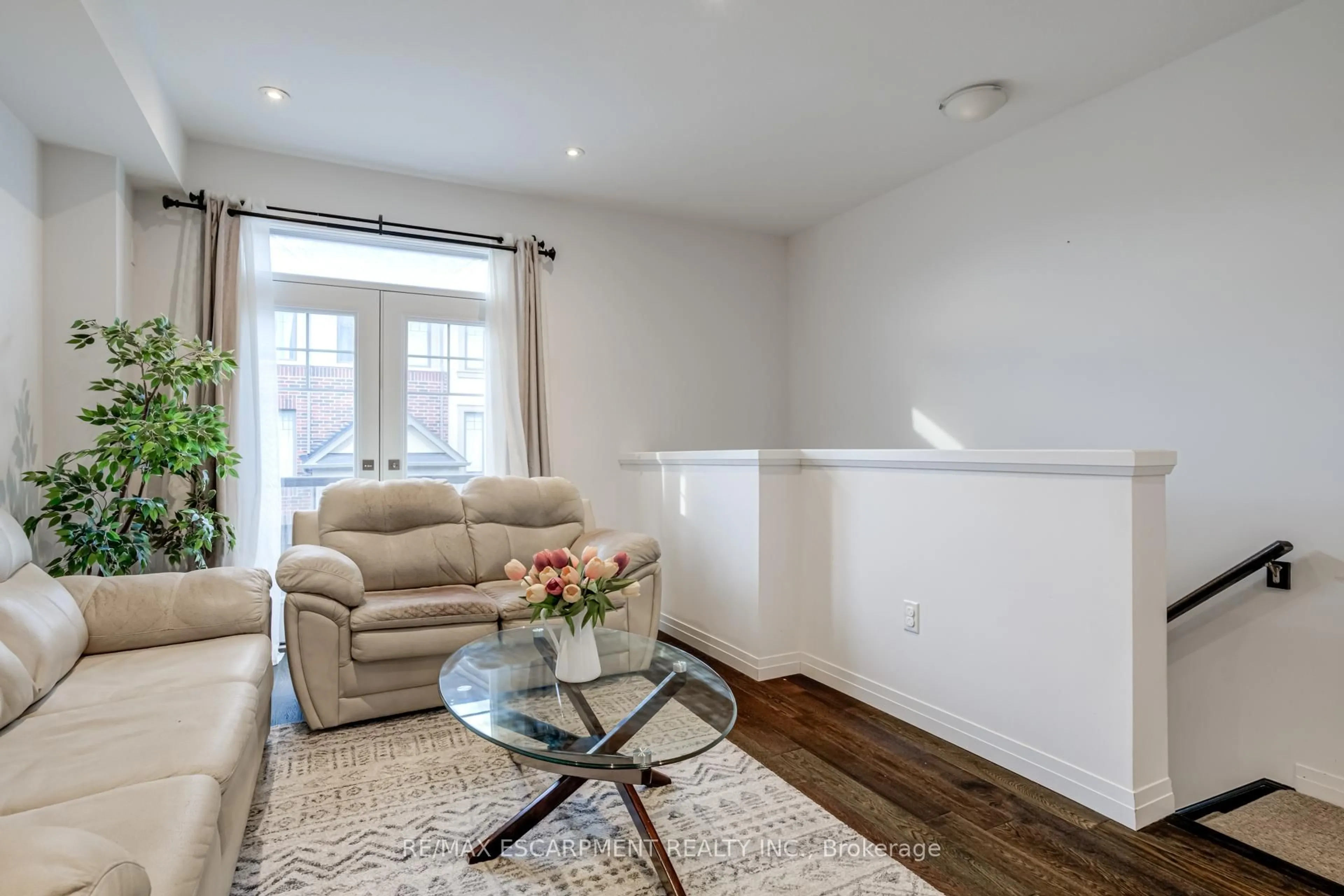 Living room with furniture, wood/laminate floor for 13 Pringle Lane, Hamilton Ontario L9G 0H2