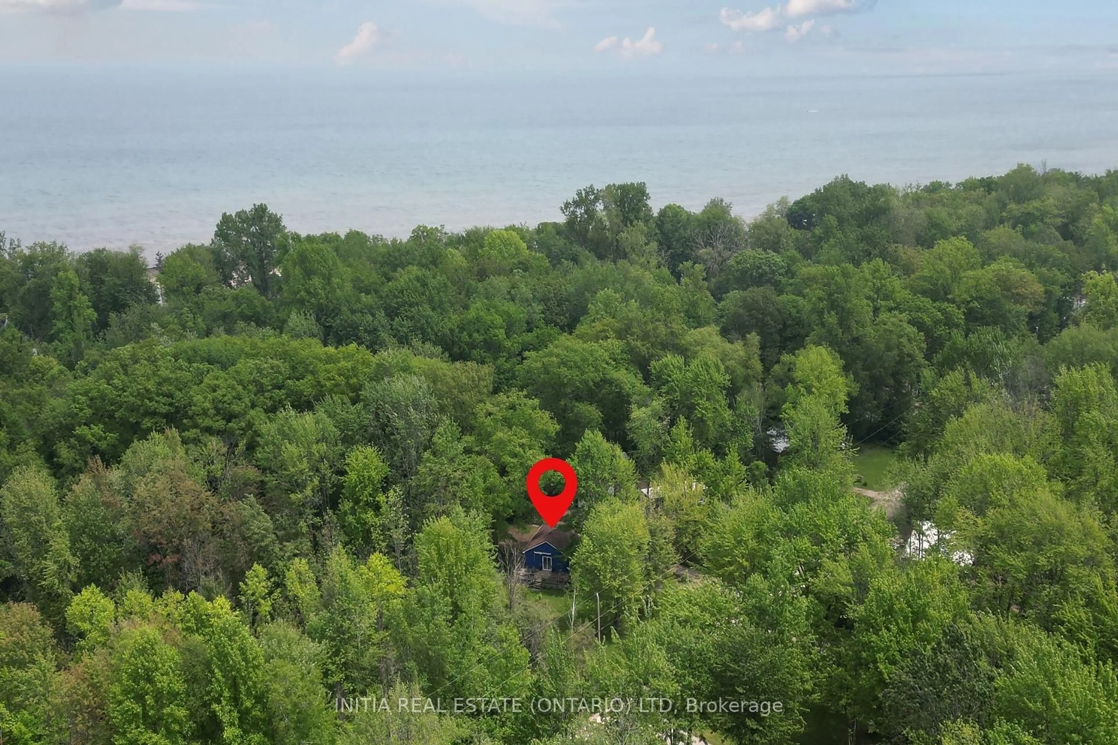 A pic from outside/outdoor area/front of a property/back of a property/a pic from drone, forest/trees view for 6078 Danbea Lane, Lambton Shores Ontario N0N 1J1