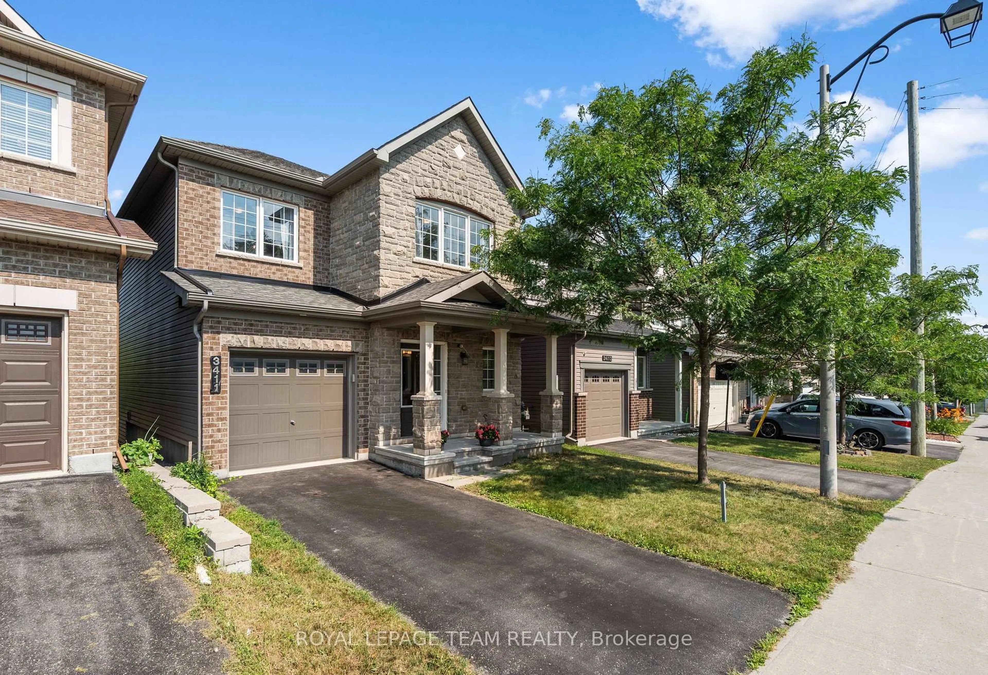 Home with brick exterior material, street for 3411 Woodroffe Ave, Ottawa Ontario K2G 7A1