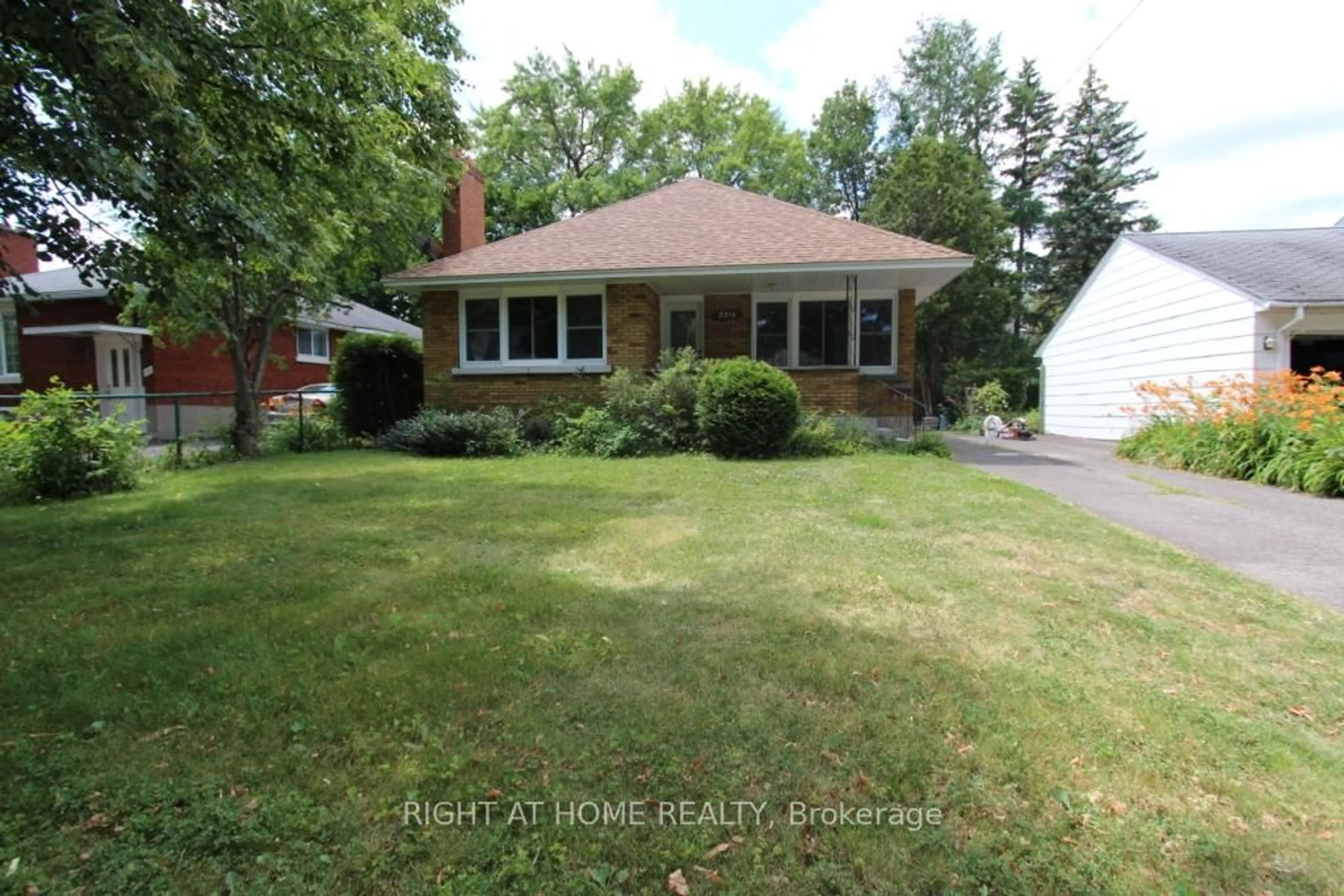 Home with brick exterior material, street for 2216 Prospect Ave, Ottawa Ontario K1H 7G3