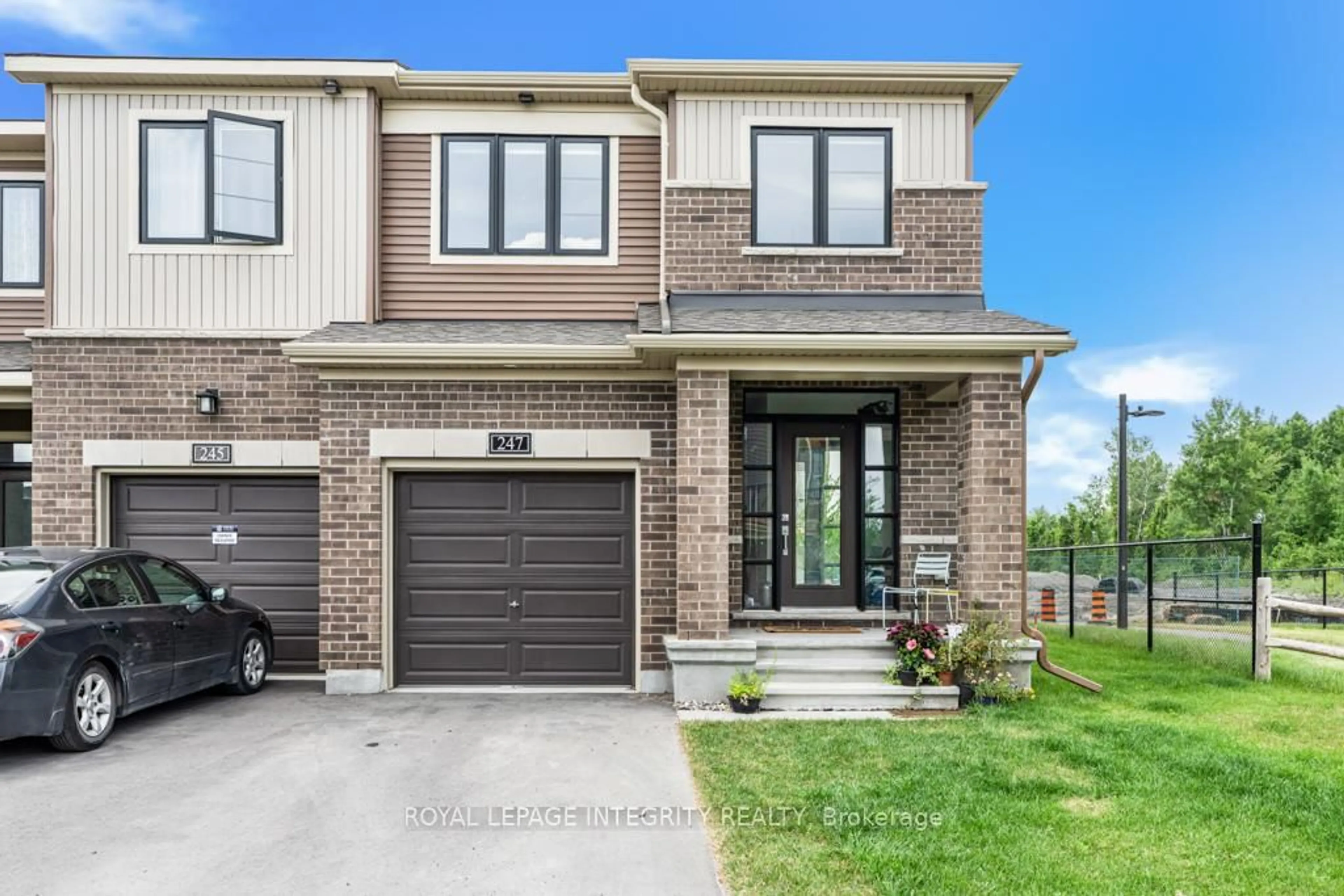 Home with brick exterior material, street for 247 Elsie Macgill Walk, Ottawa Ontario K2W 0L4