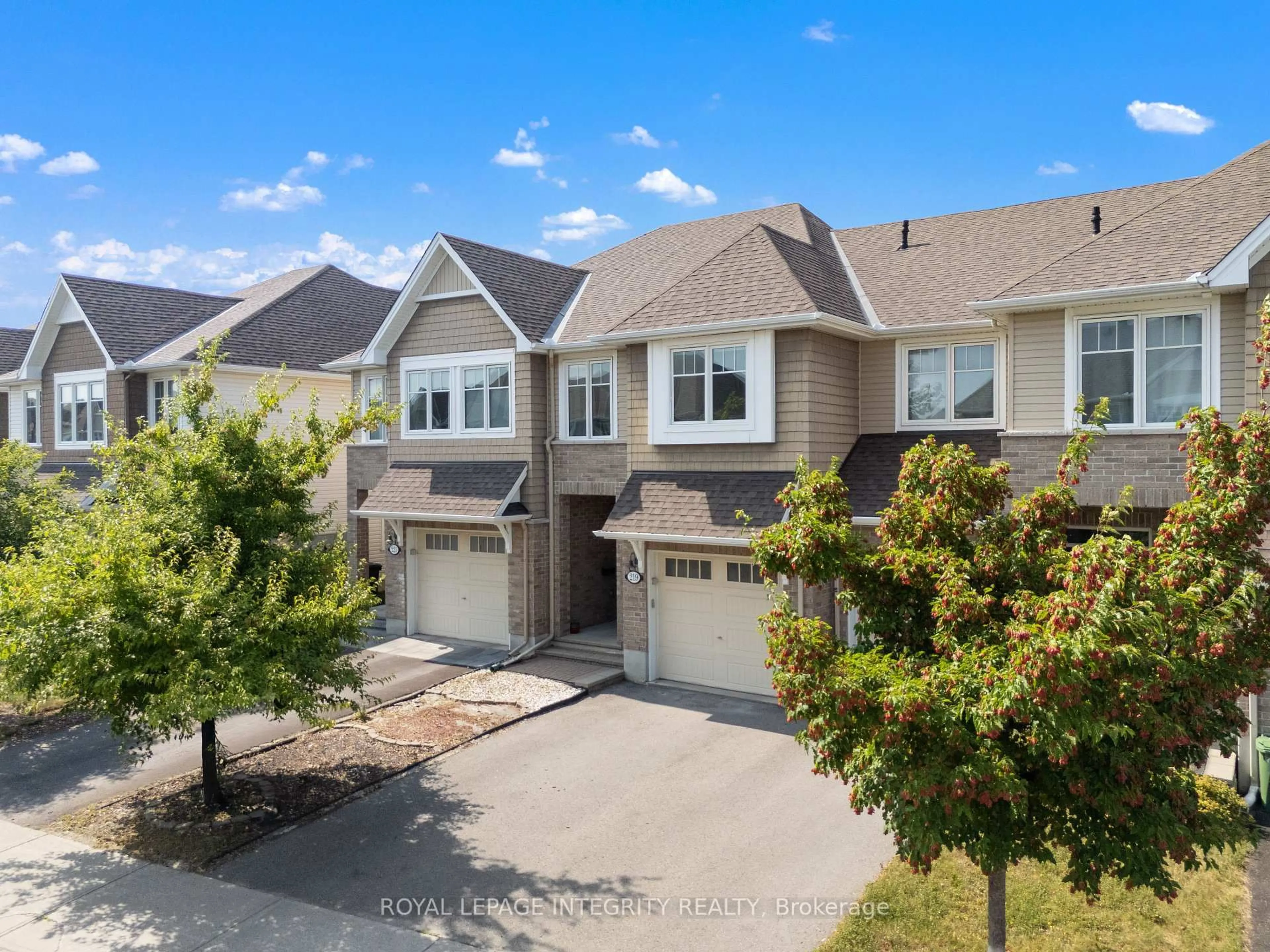 A pic from outside/outdoor area/front of a property/back of a property/a pic from drone, street for 219 BRAMBLING Way, Ottawa Ontario K2J 0E4