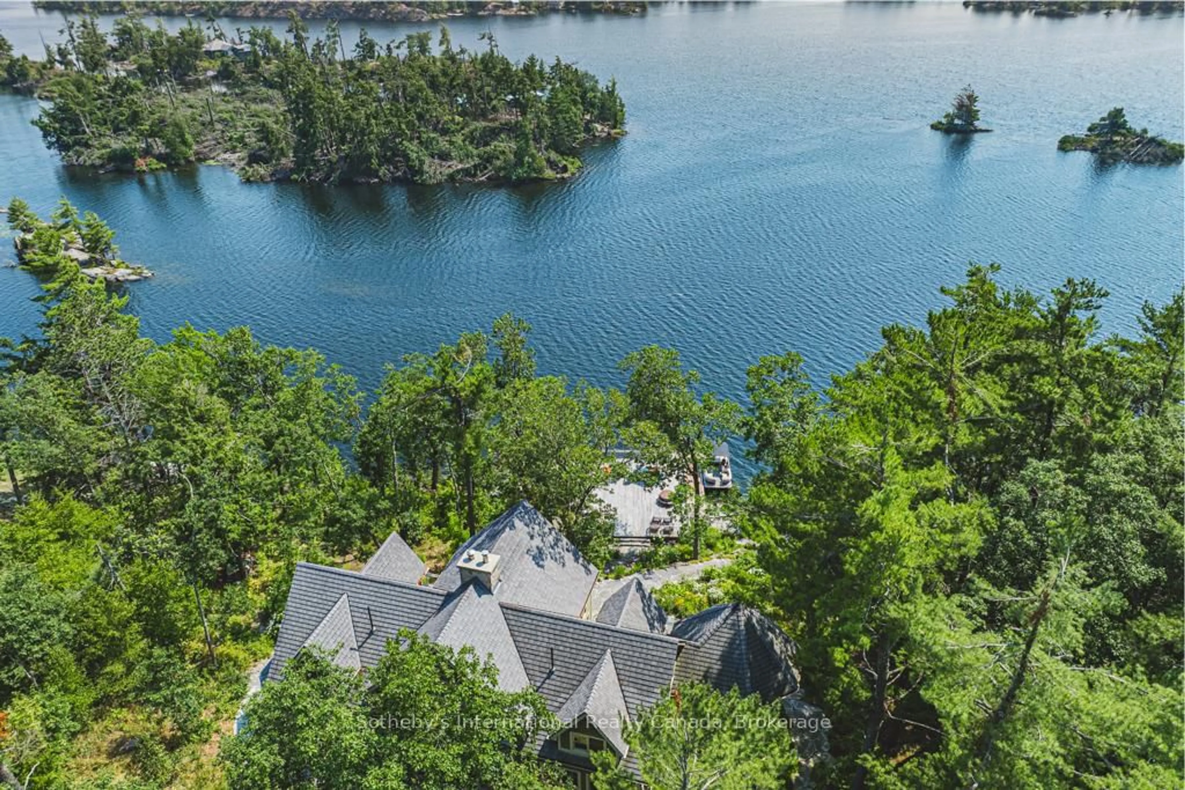 A pic from outside/outdoor area/front of a property/back of a property/a pic from drone, water/lake/river/ocean view for 2755, 2760 Casement Island, North Kawartha Ontario K0L 3E0