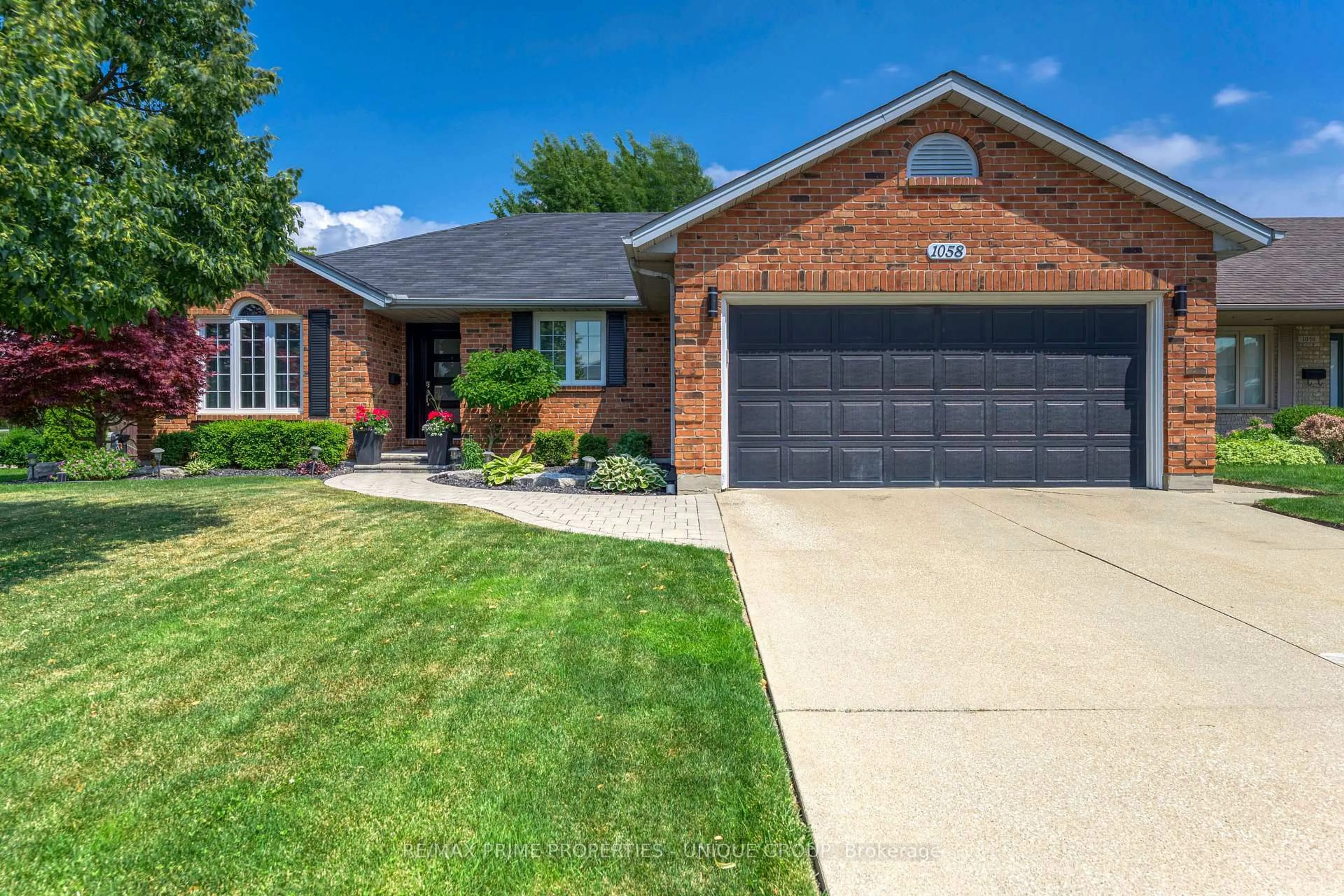 Home with brick exterior material, street for 1058 Finch Dr, Sarnia Ontario N7S 6A8