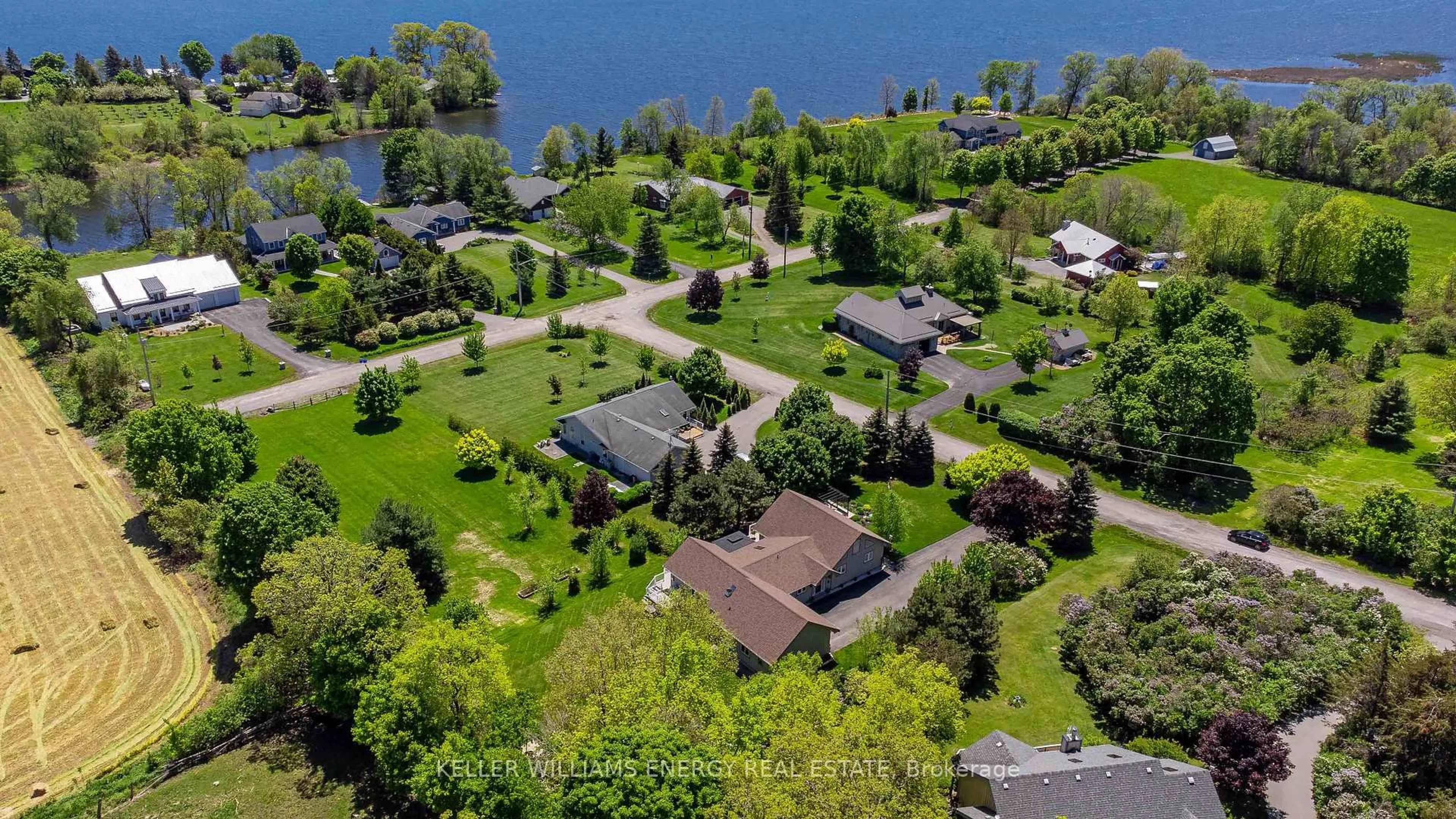 A pic from outside/outdoor area/front of a property/back of a property/a pic from drone, water/lake/river/ocean view for 43 Smiths Bay Ave, Prince Edward County Ontario K0K 2T0