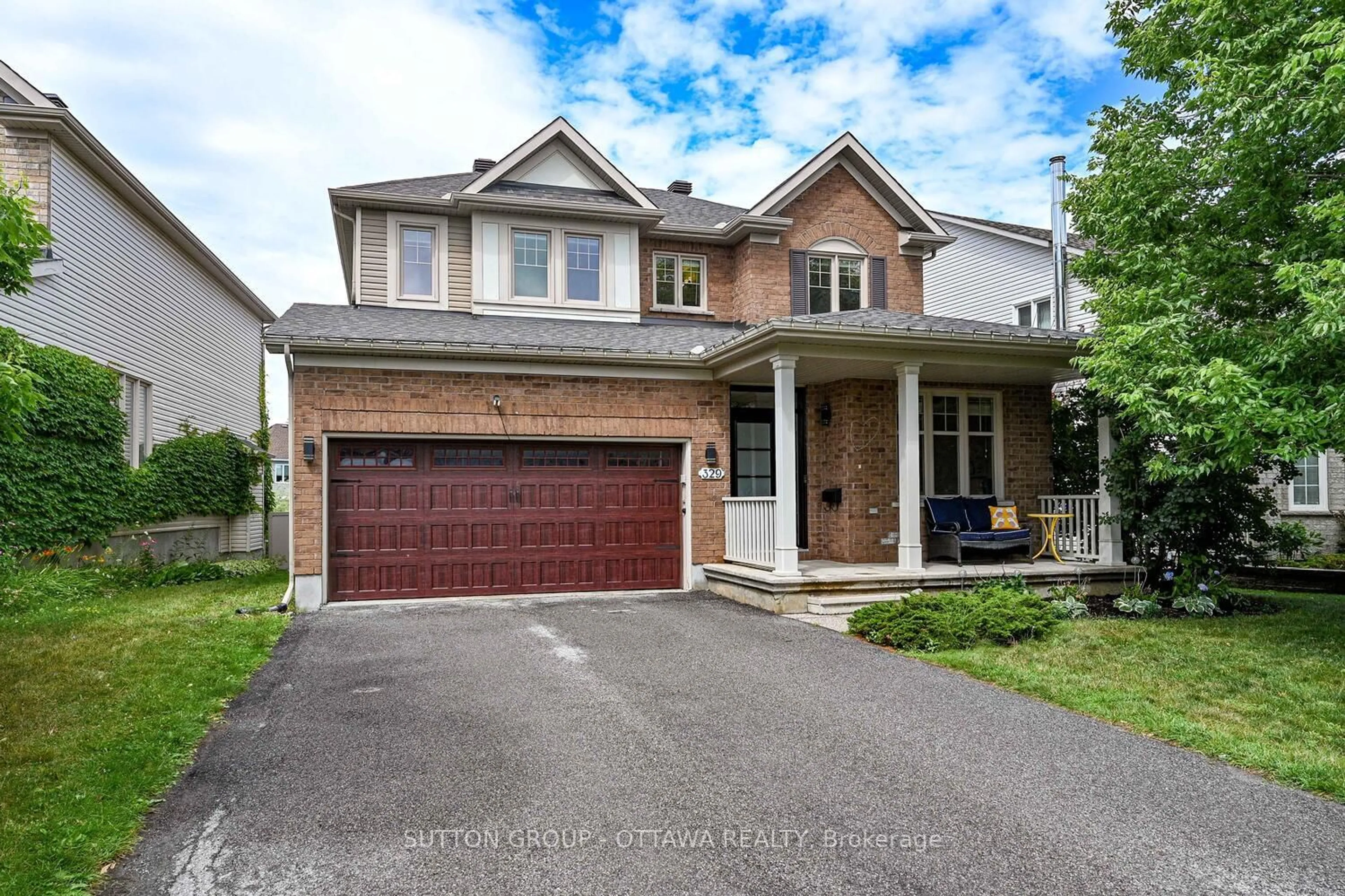 Home with brick exterior material, street for 329 West Ridge Dr, Stittsville Ontario K2S 2G7